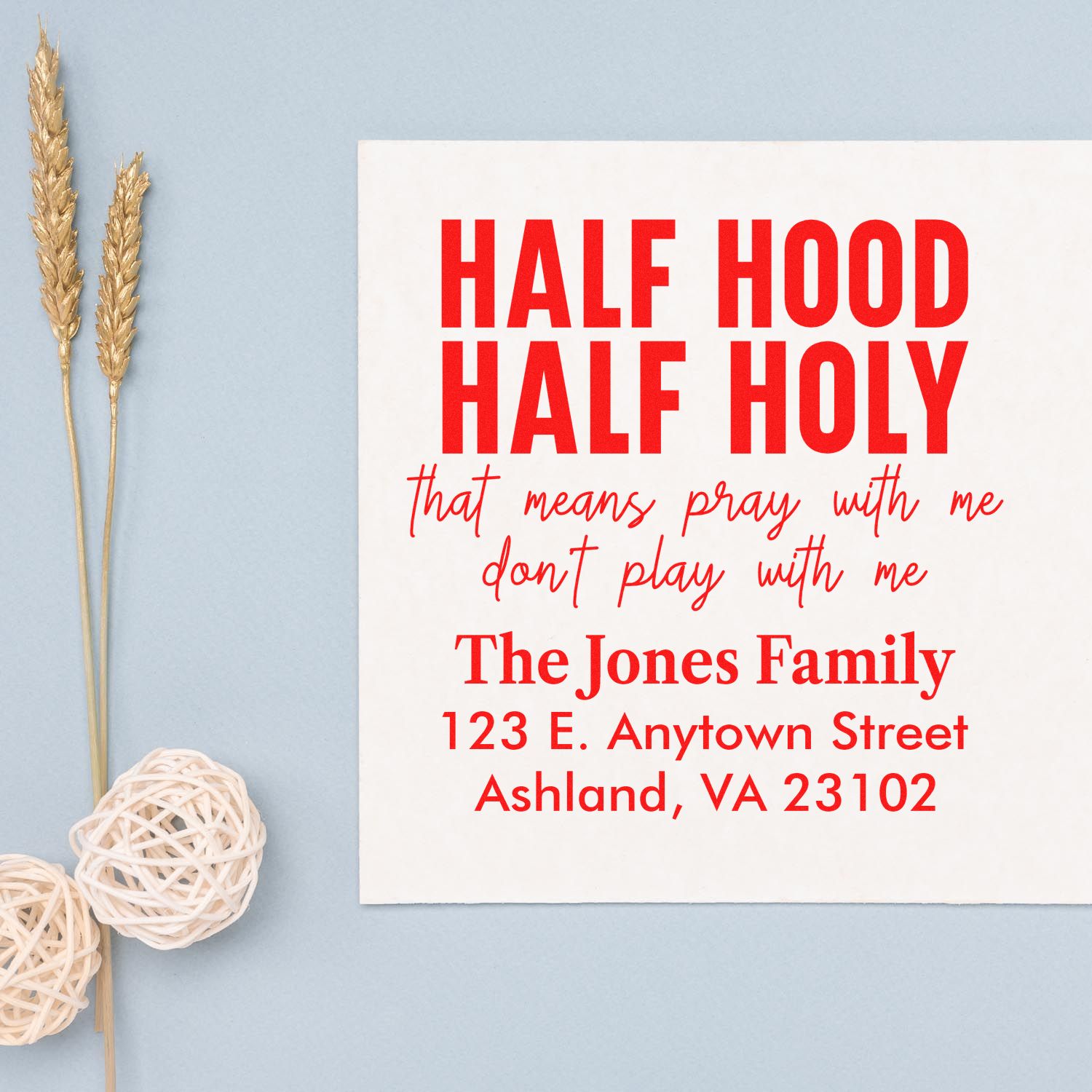 Custom rubber stamp design with bold Half Hood Half Holy quote and personalized family address for mailing and cards.