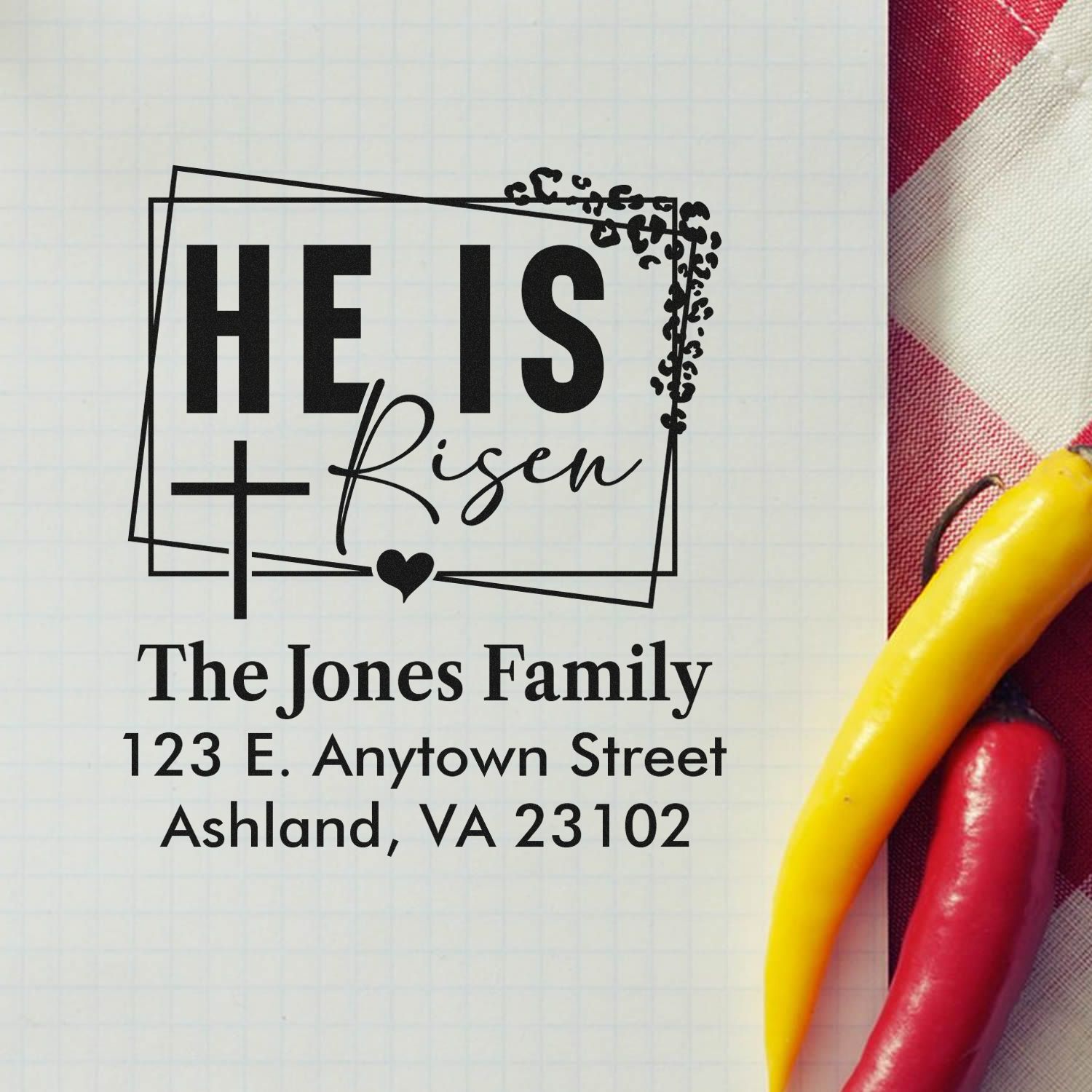 Custom Christian rubber stamp with He Is Risen and family address for Easter cards, church mailings, and stationery.