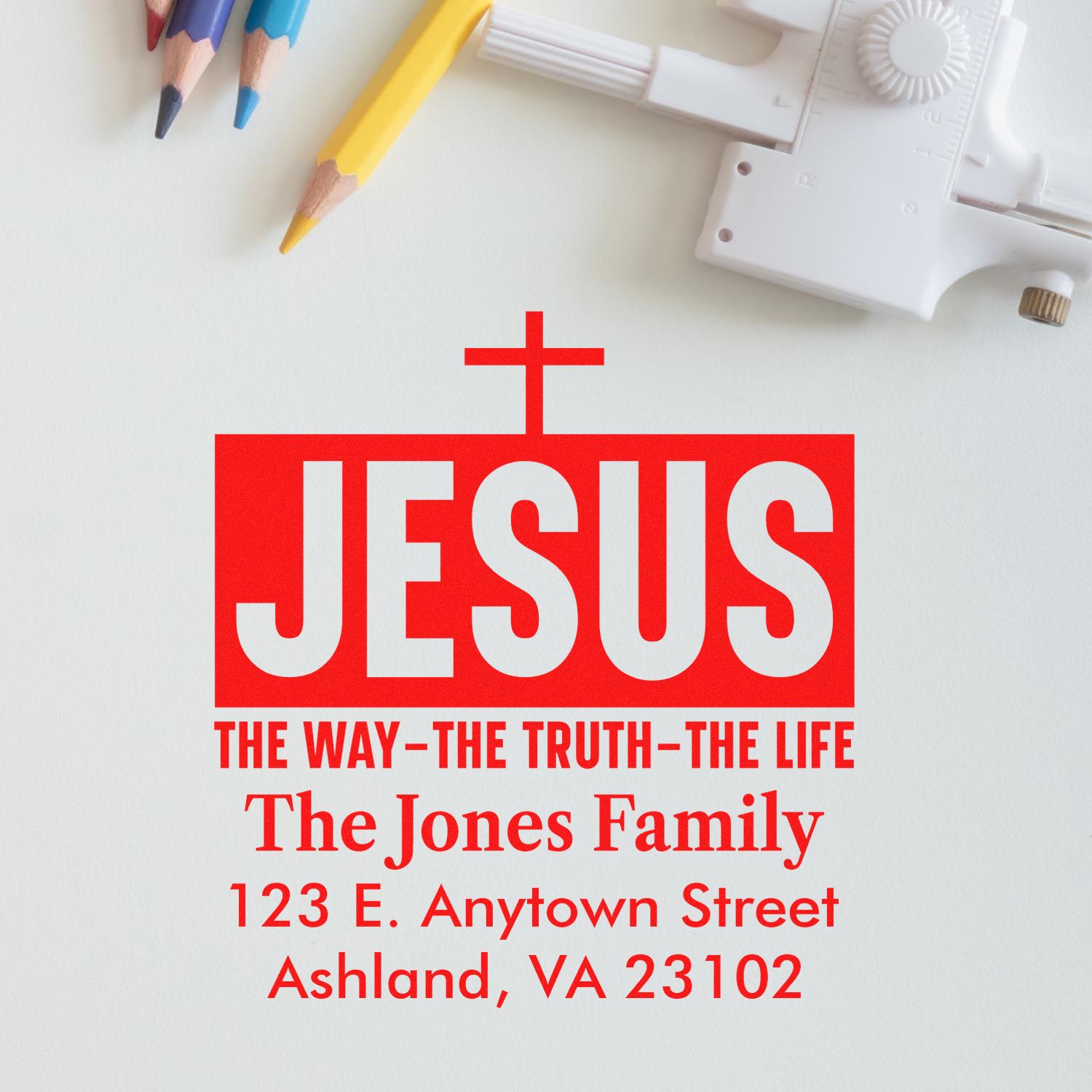 Custom return address rubber stamp with Jesus design, scripture tagline, and The Jones Family mailing address.