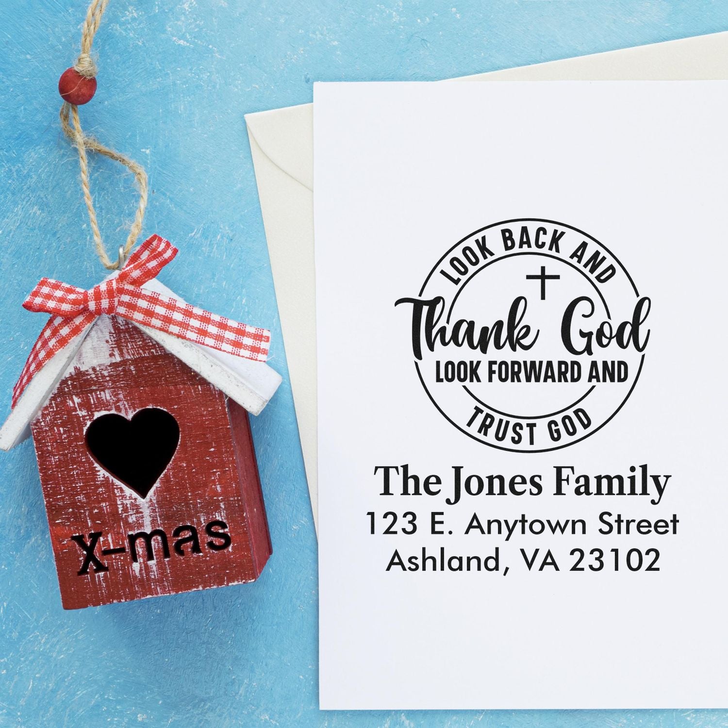 Custom rubber stamp with faith-based thank you message and personalized family address for holiday cards.