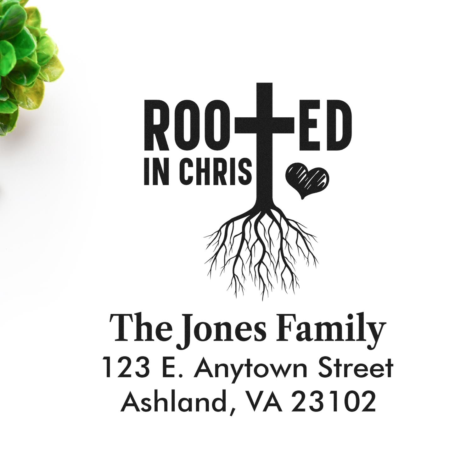 Custom Christian rubber stamp with Rooted in Christ design, family name, and return address.