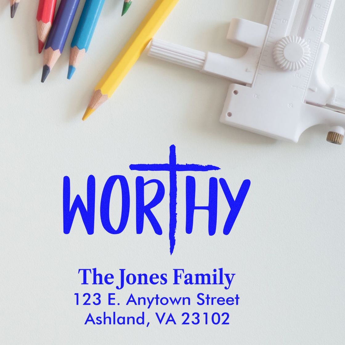 Custom Worthy family return address rubber stamp with The Jones Family, 123 E. Anytown Street, Ashland, VA 23102.