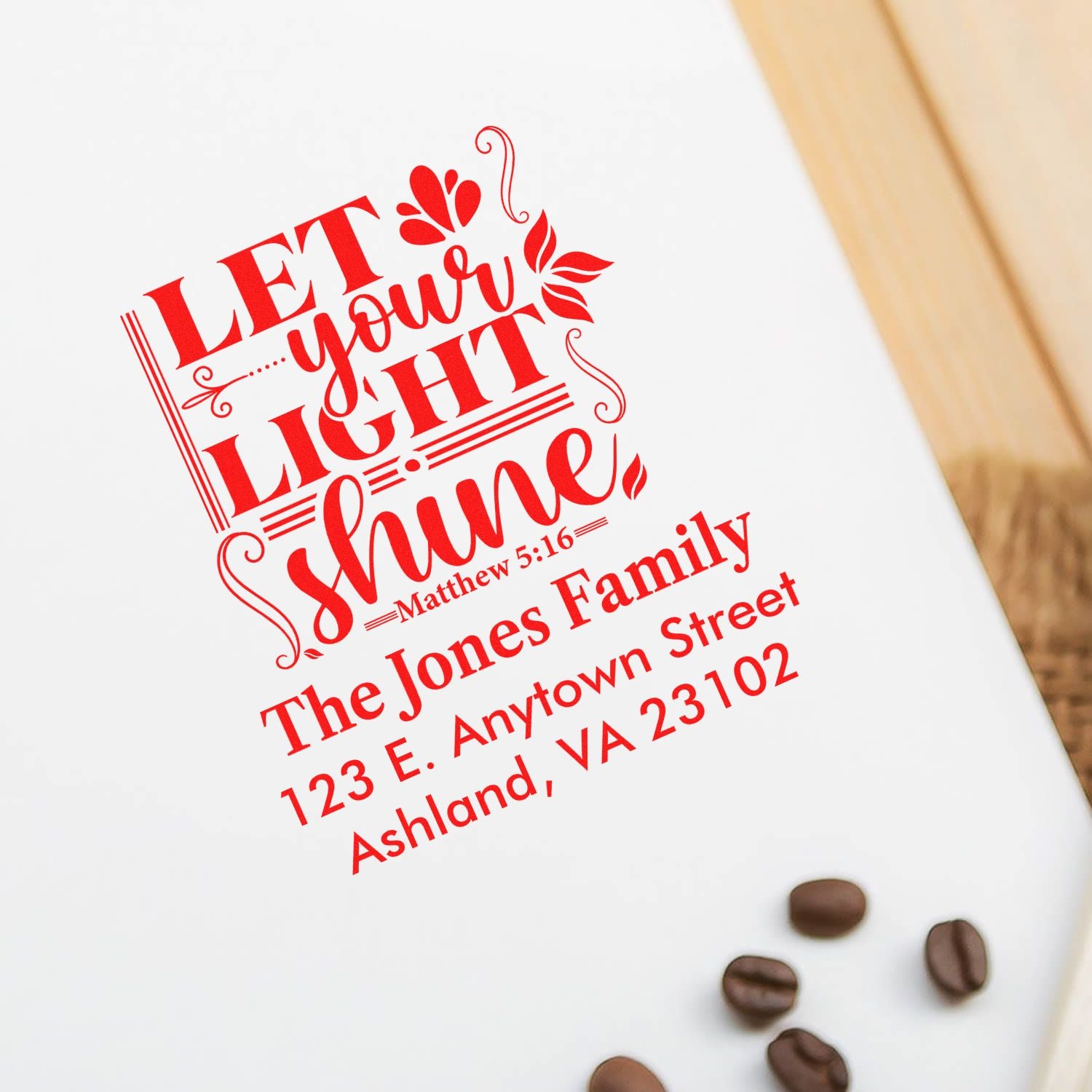 Custom rubber stamp with Let Your Light Shine Bible verse and personalized family address for envelopes and stationery.