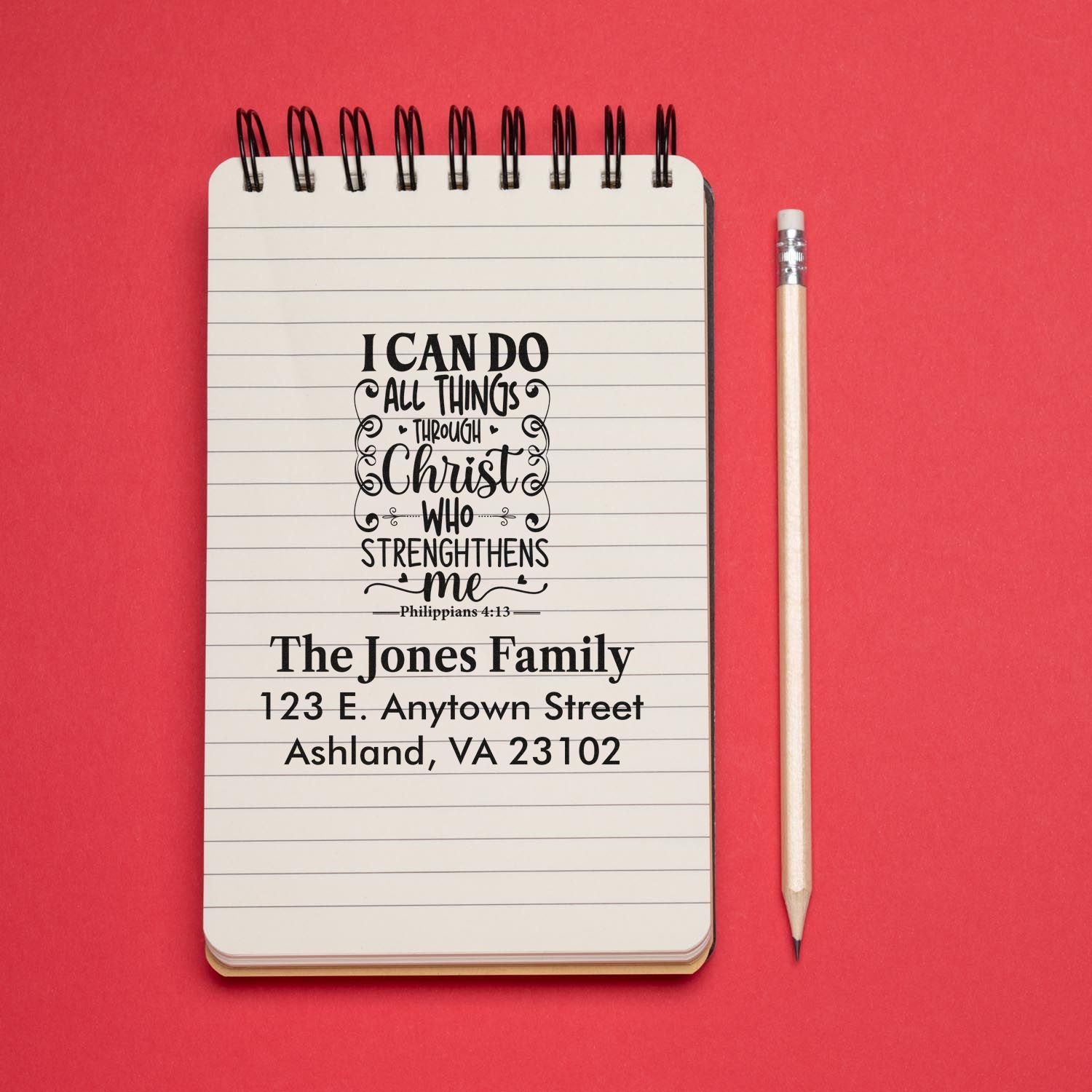 Custom Christian address stamp mockup with Philippians 4:13 and The Jones Family return address for personalized rubber stamping.