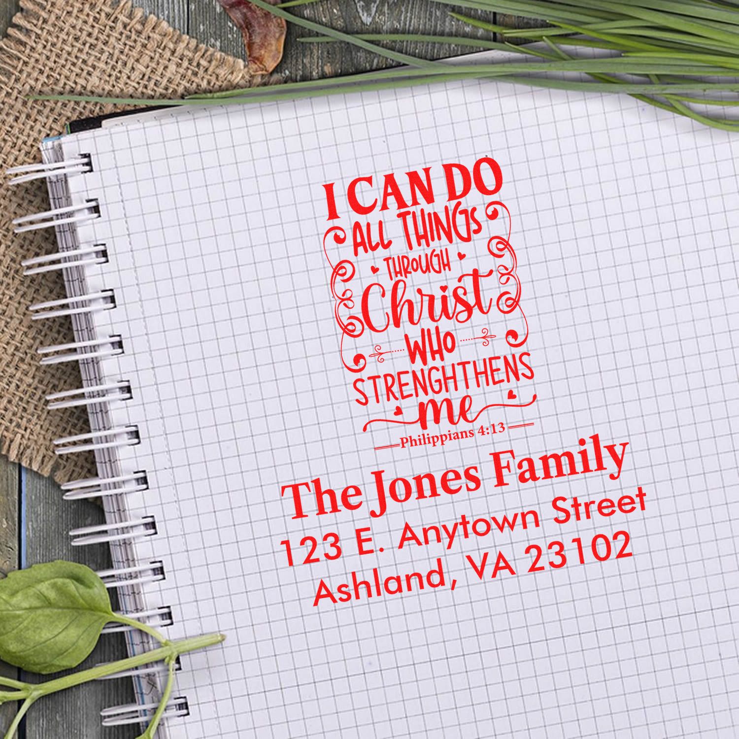 Custom Christian rubber stamp design with Philippians 4:13 Bible verse, family name, and address for notebooks and gifts.