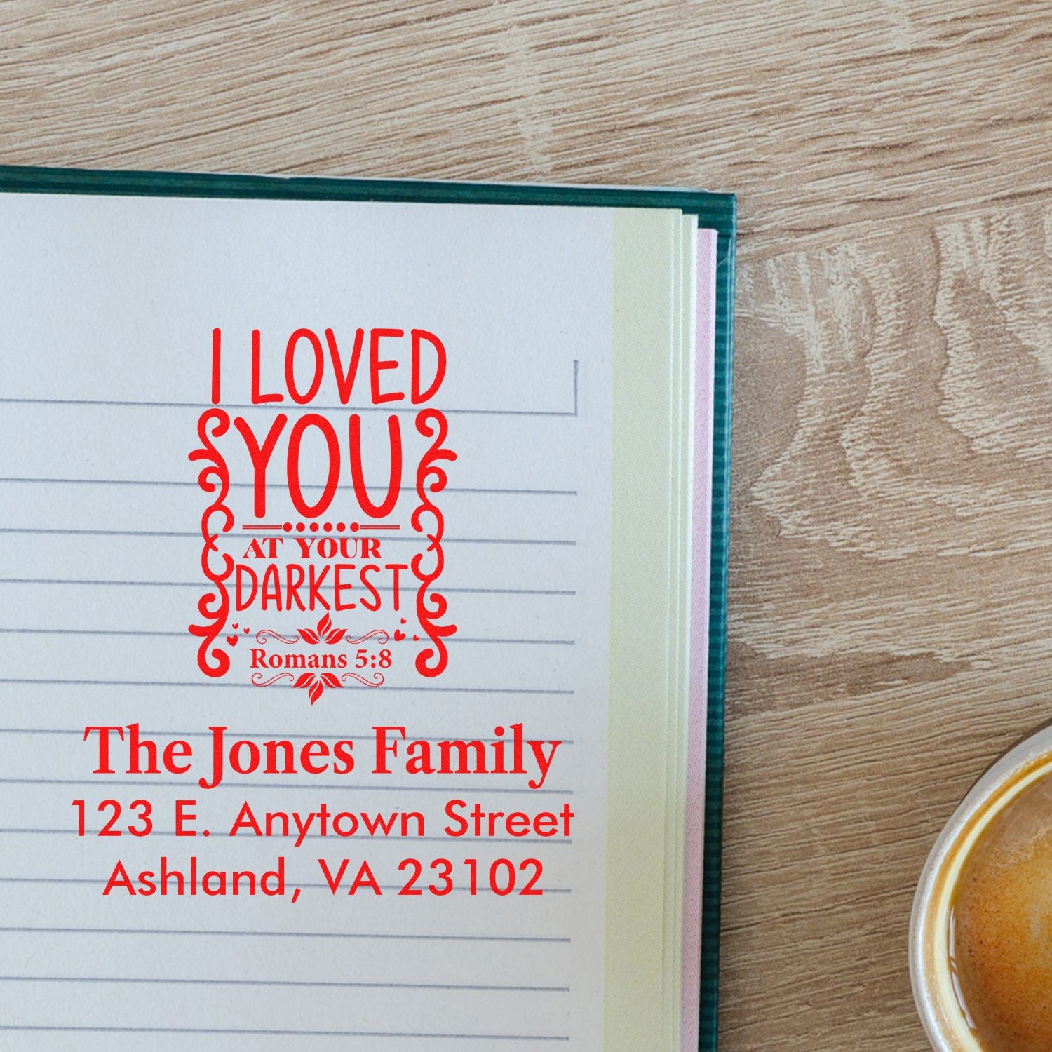 Personalized Christian rubber stamp proof with Romans 5:8 quote and return address for envelopes and cards.