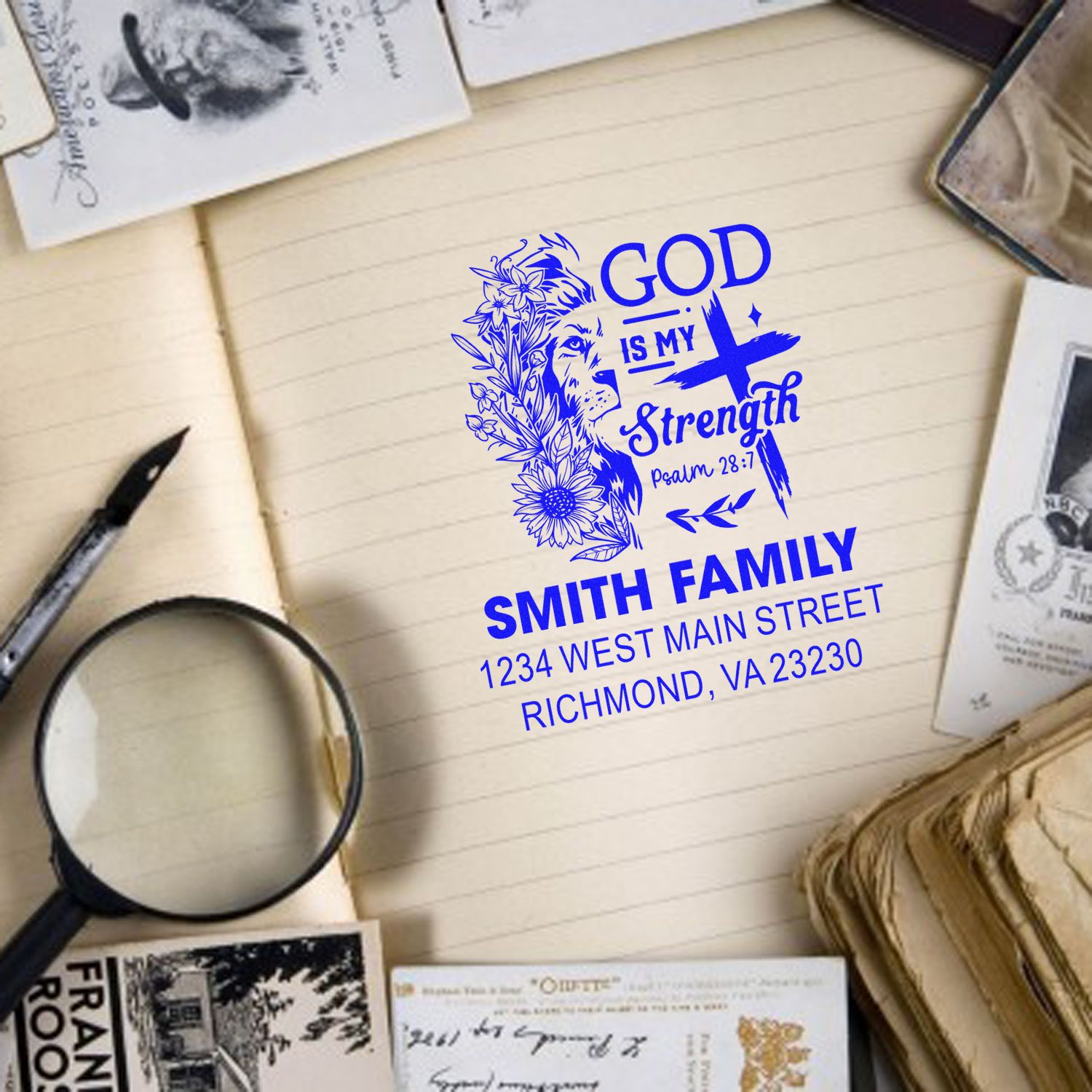 Custom Christian rubber stamp with God Is My Strength Psalm 28:7, lion cross art, and Smith family address for stationery.