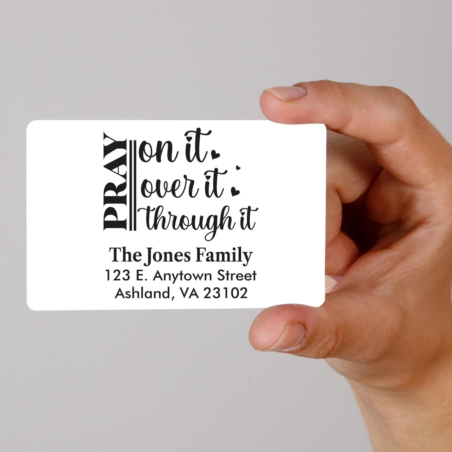 Custom rubber address stamp with pray on it, over it, through it quote and The Jones Family mailing address.