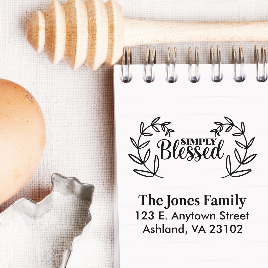 Custom rubber stamp for family address with Simply Blessed wreath logo and The Jones Family mailing address
