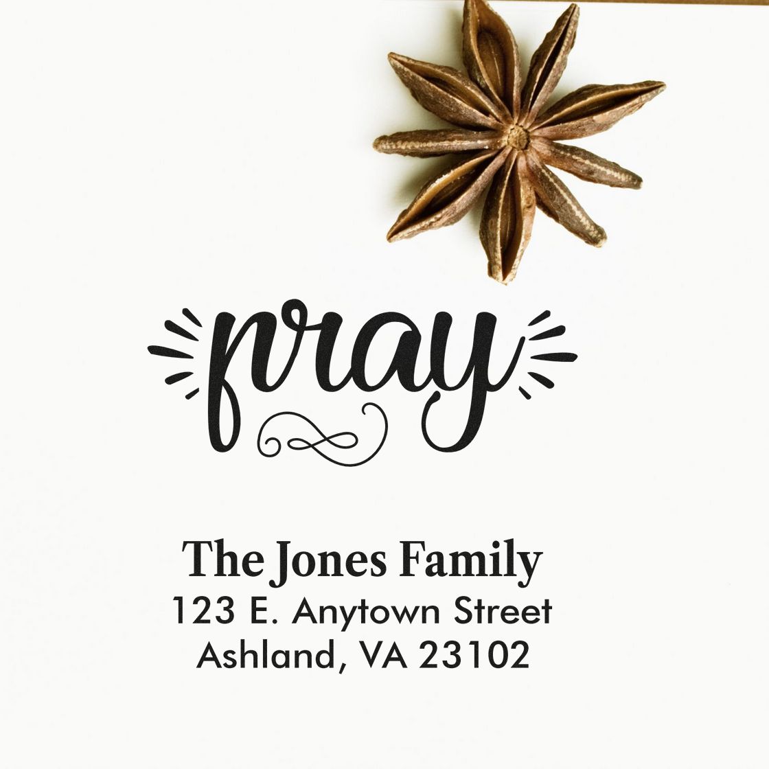 Custom rubber stamp with pray design and personalized return address for The Jones Family, ideal for faith-based mailings.
