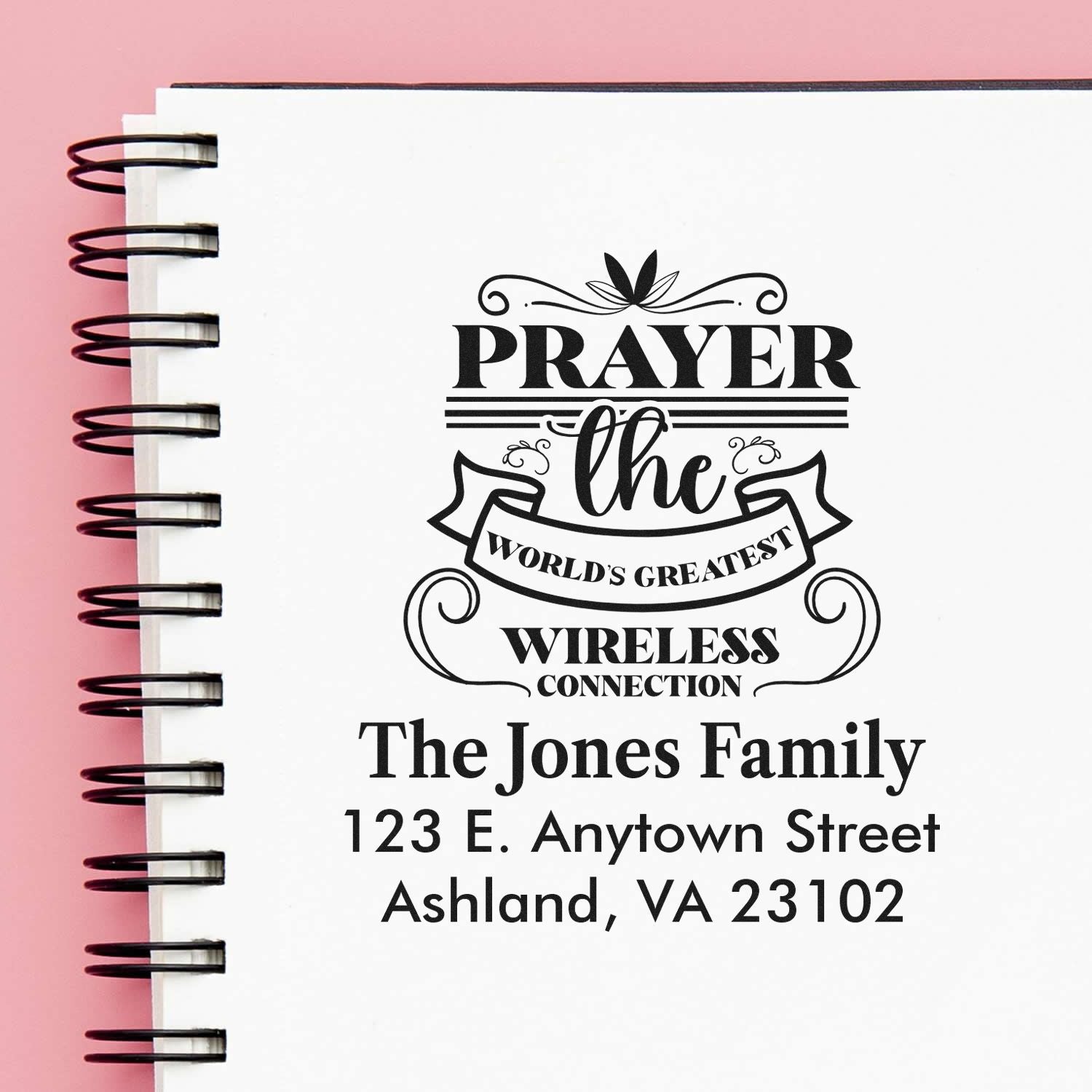 Custom rubber stamp design with prayer quote, family name, and address for personalized Christian stationery or gift use.
