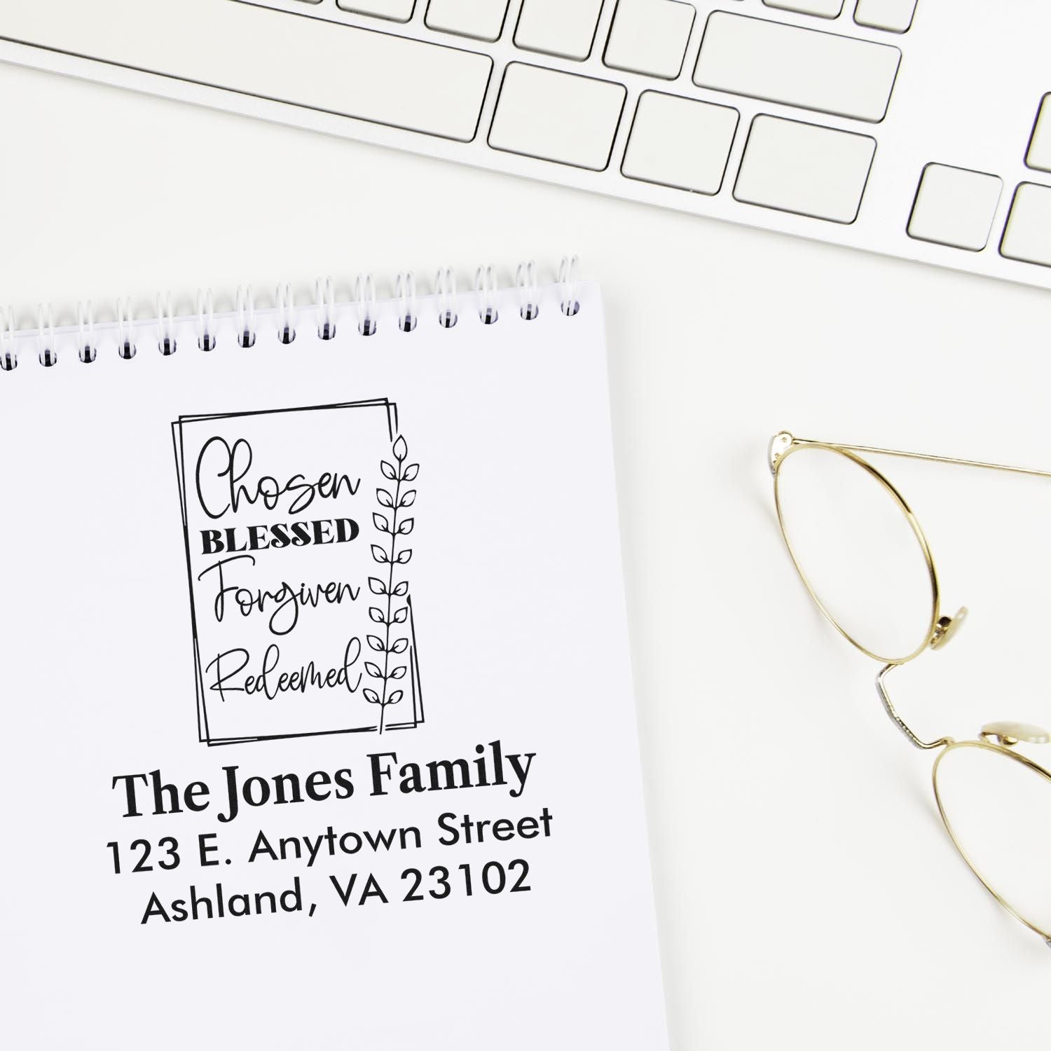 Custom family address rubber stamp with Chosen Blessed Forgiven Redeemed design for Christian stationery.