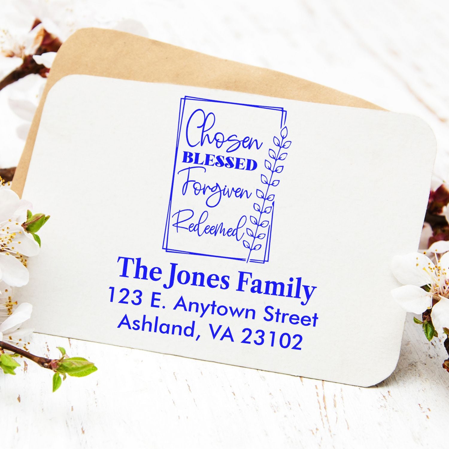Custom Christian return address rubber stamp on envelope with Chosen Blessed Forgiven Redeemed and family address.