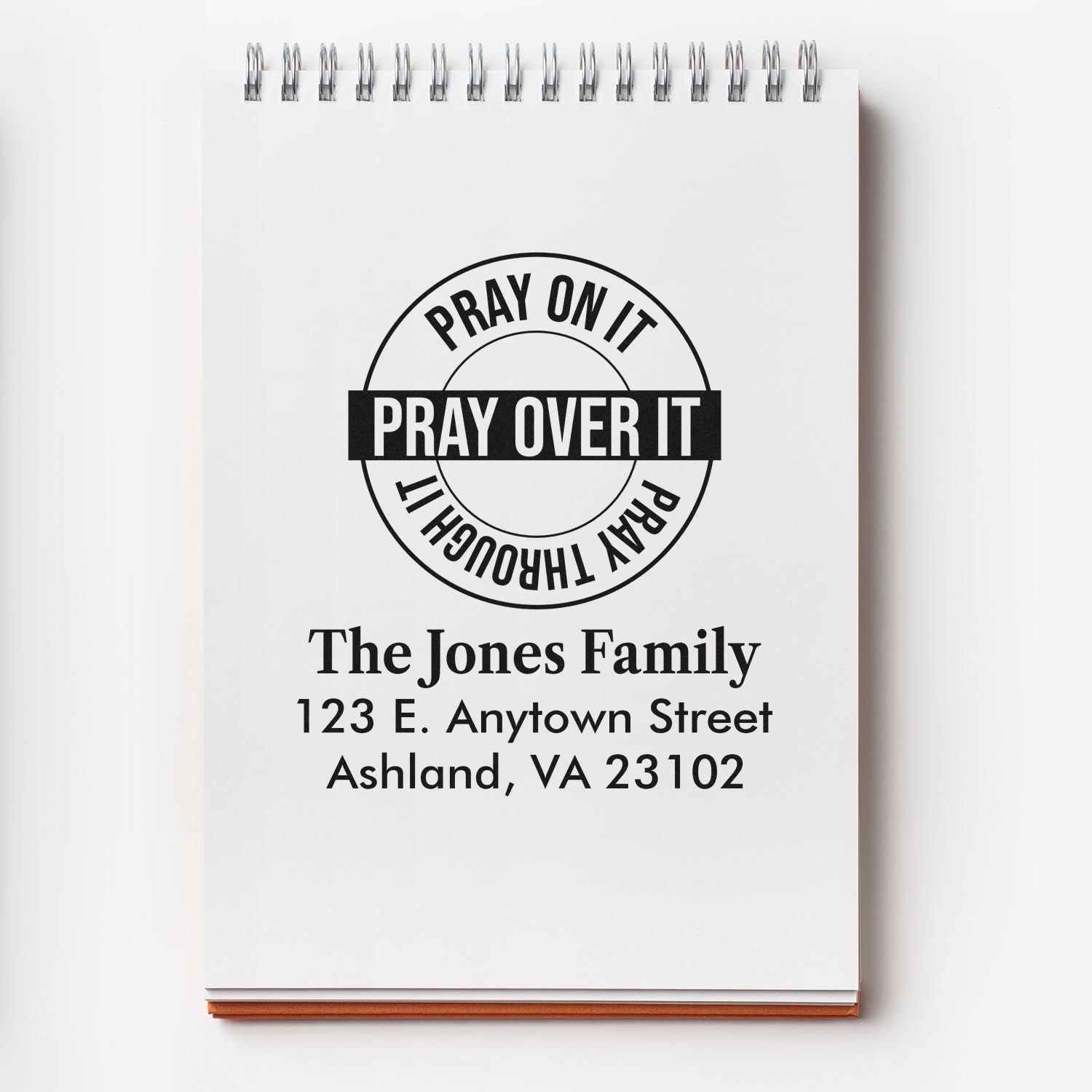 Custom rubber stamp mockup with Pray Over It and personalized family return address.
