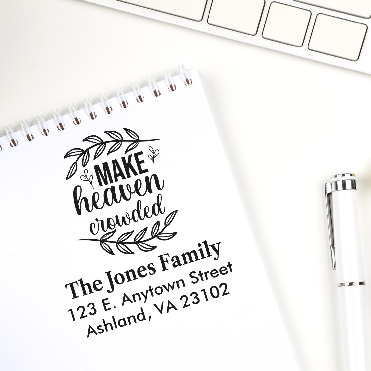 Custom address rubber stamp with Make heaven crowded design, ideal for personalized family return mailing.