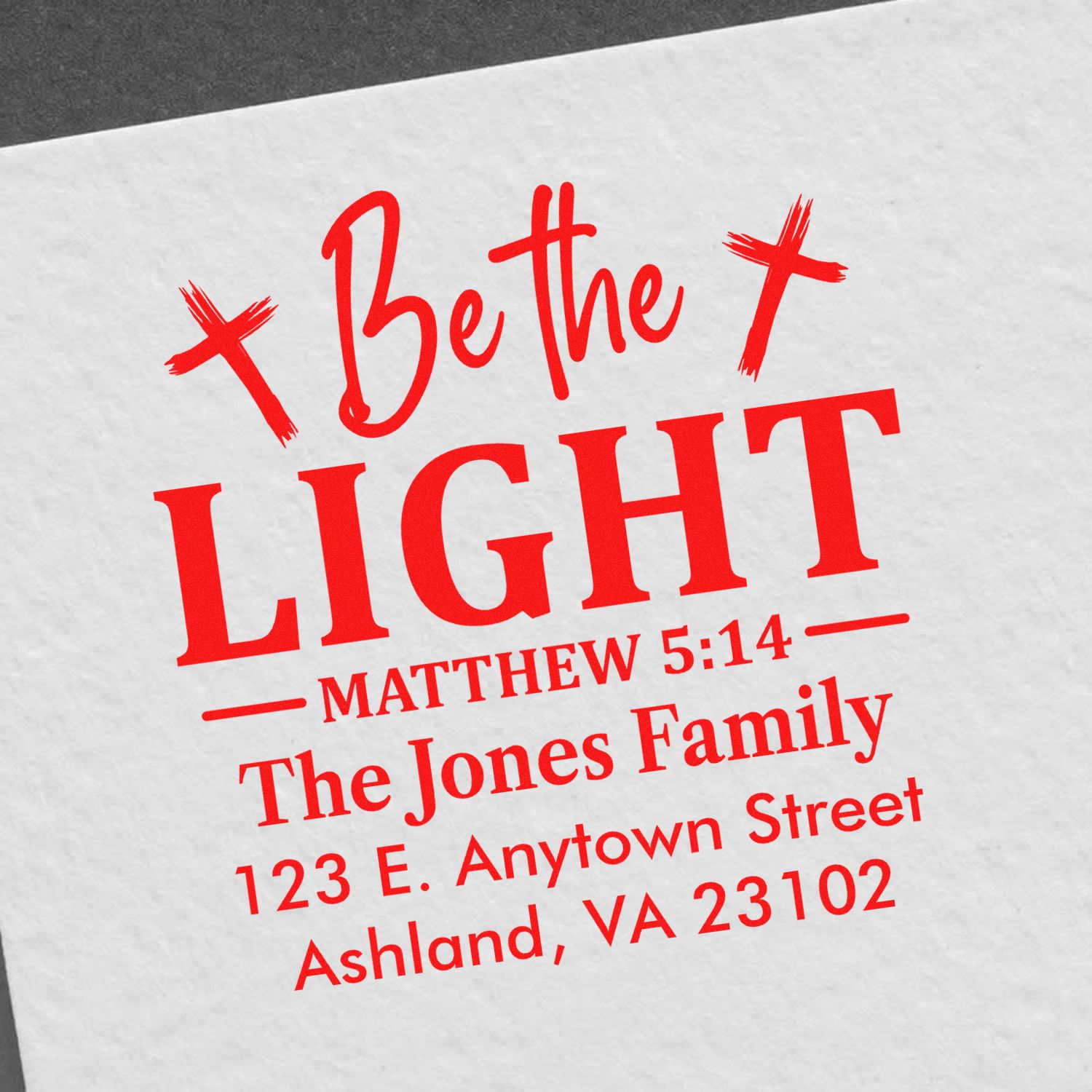 Custom family address rubber stamp with Be the Light Matthew 5:14 Bible verse and return address.