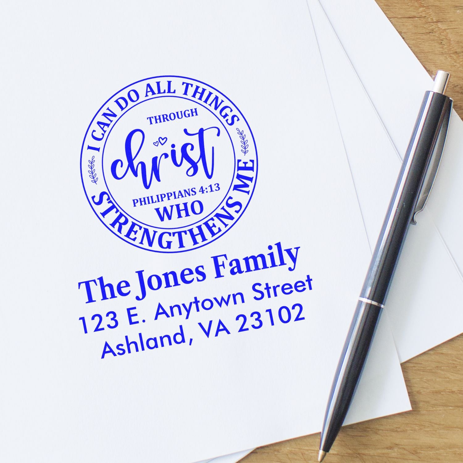 Custom Christian address rubber stamp with Philippians 4:13 verse, family name, and return address.
