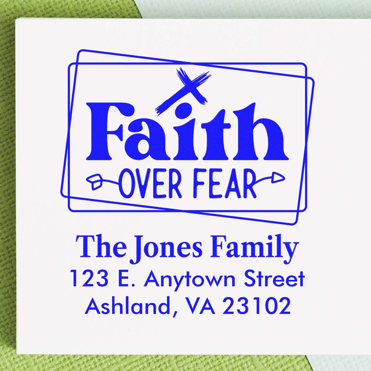 Custom faith over fear address stamp with family name and return address for personalized envelopes and faith-based mail.