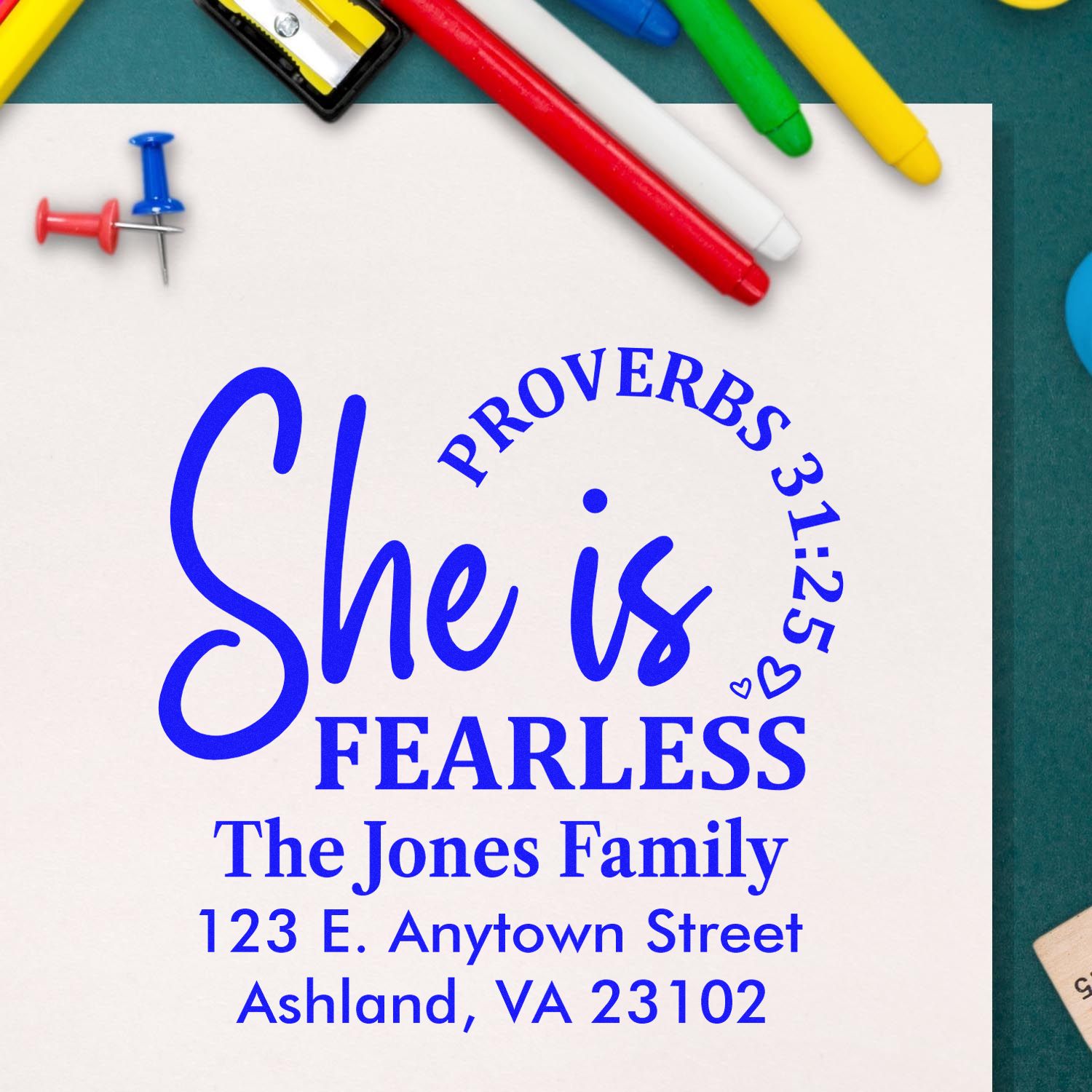 Personalized rubber address stamp design featuring She is fearless Proverbs 31:25, Jones family name, and mailing address.