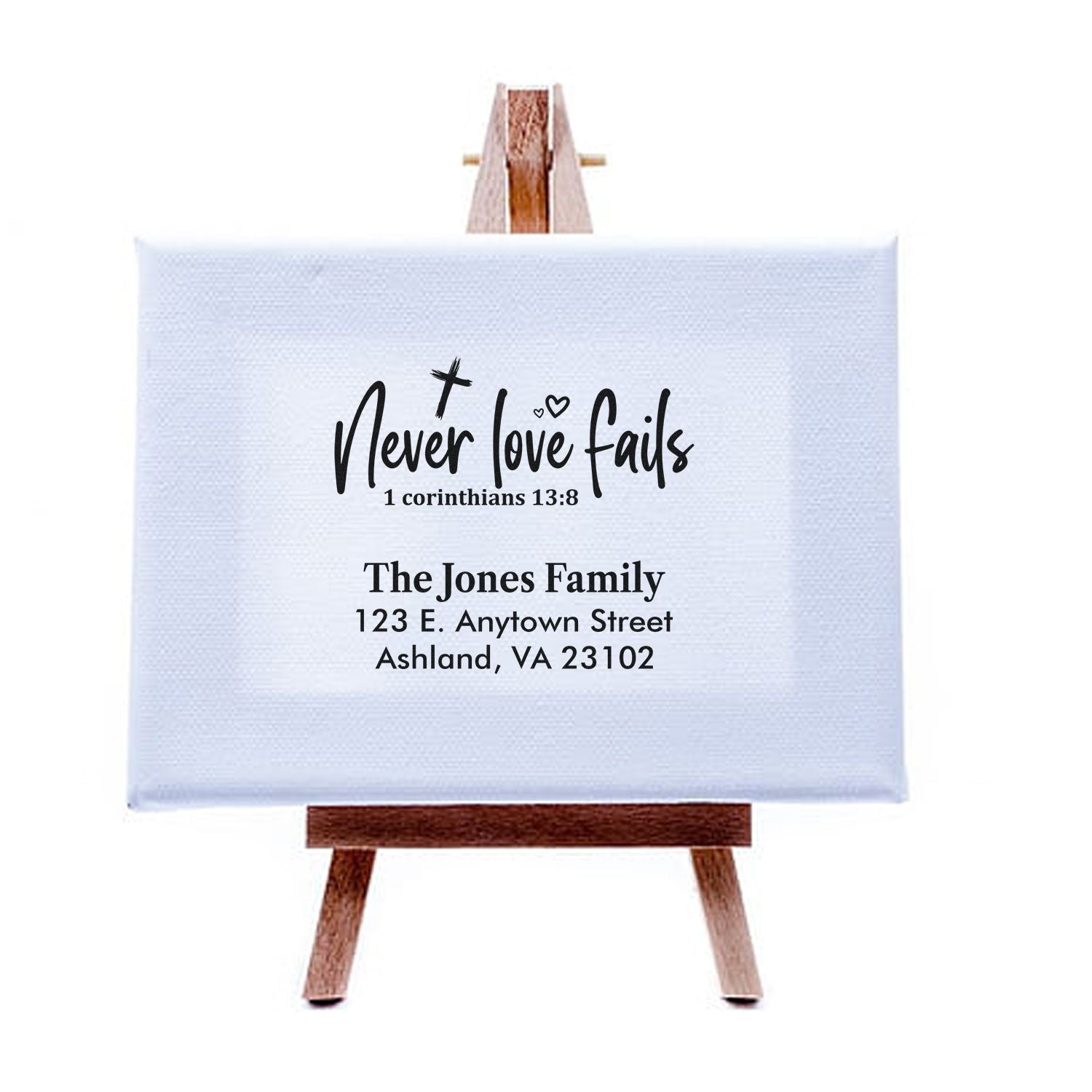 Custom family address rubber stamp design with Love never fails Bible verse and personalized return address.