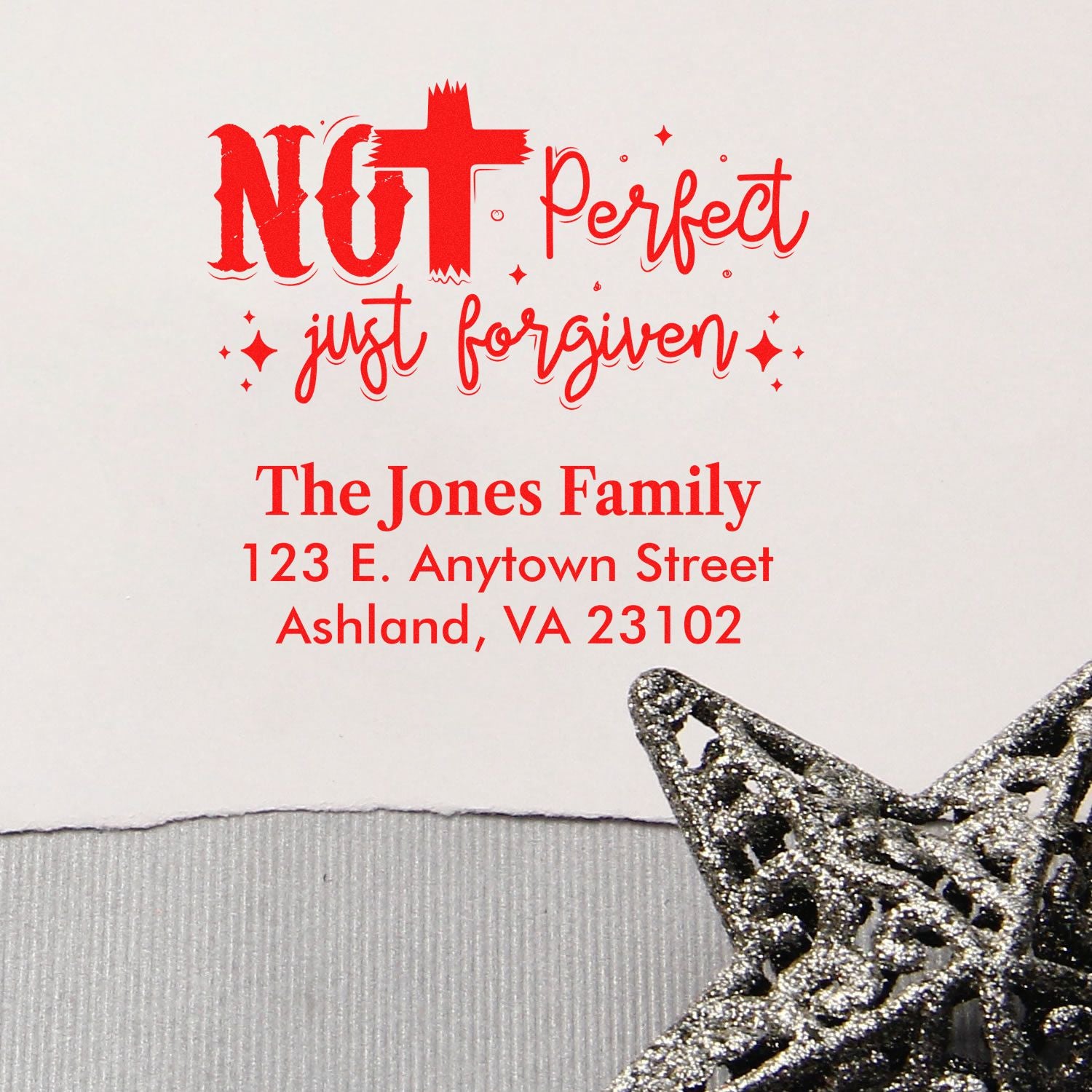 Personalized rubber address stamp with Not Perfect, Just Forgiven message and family name for custom envelopes and cards.