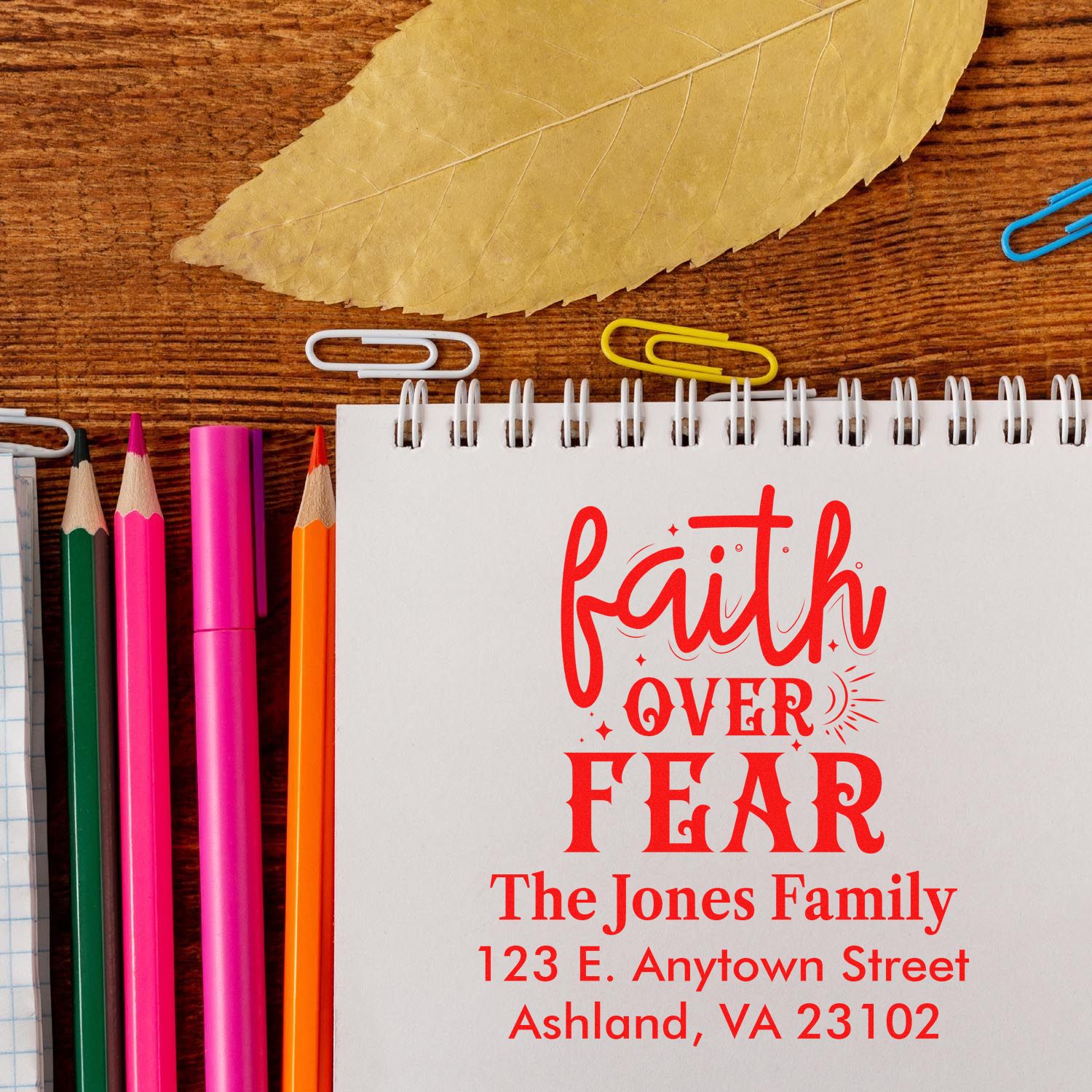 Custom rubber stamp design with Faith Over Fear and a personalized family return address for stationery and envelopes.