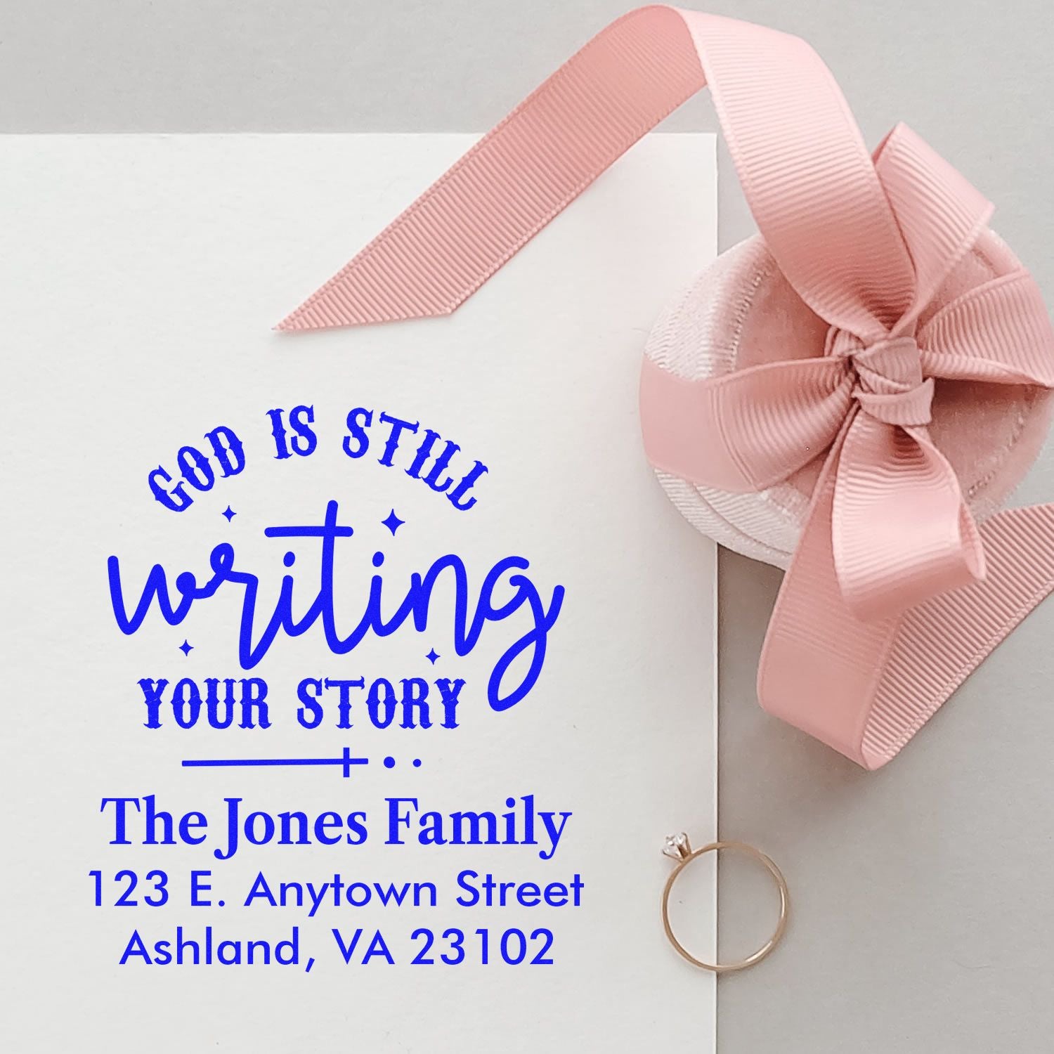 Custom rubber stamp for wedding stationery with faith-based quote, family name, and return address for personalized envelopes.