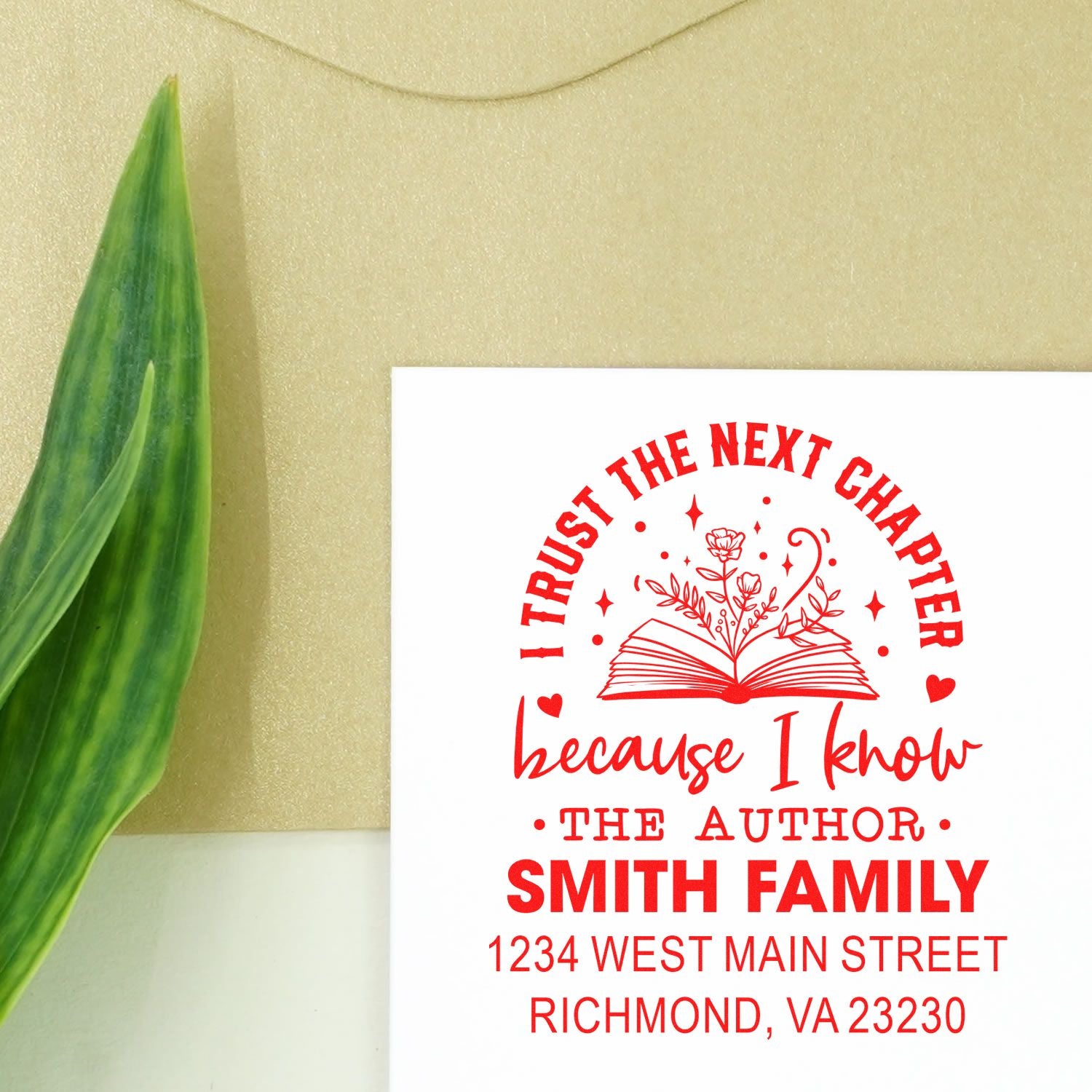 Custom book-themed return address rubber stamp with I trust the next chapter text for Smith Family, Richmond, VA.