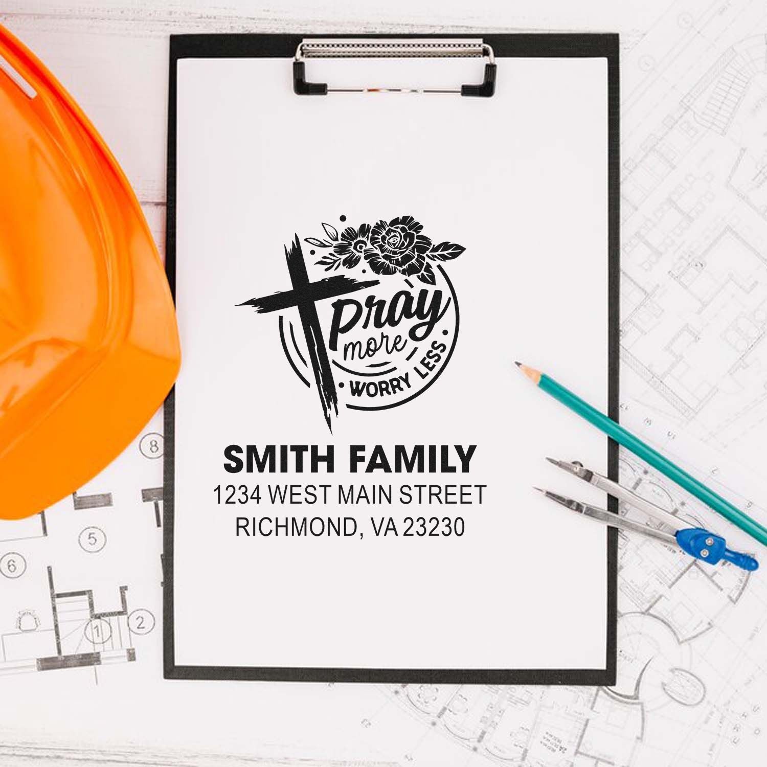 Personalized rubber stamp design with Christian cross, floral Pray more worry less message, and Smith Family address.