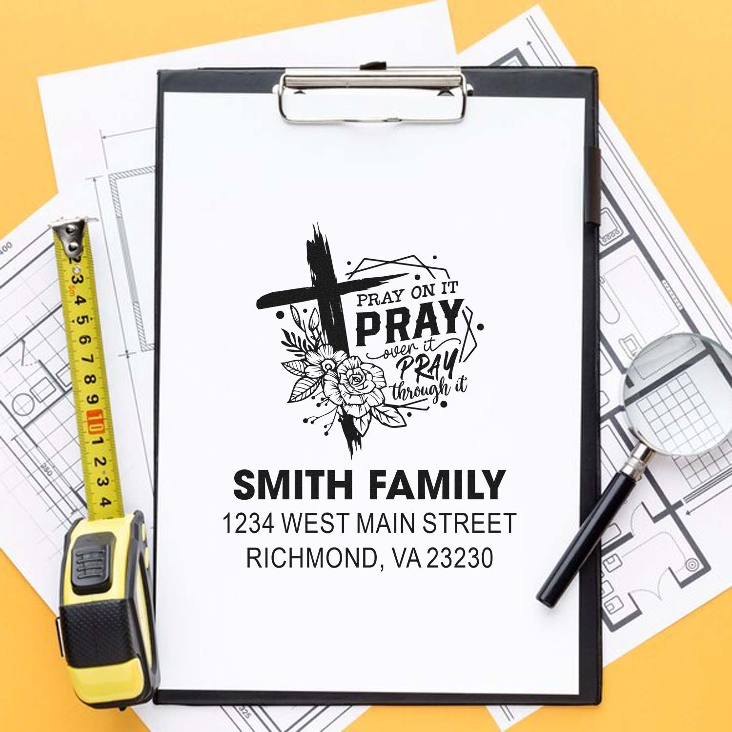 Personalized rubber stamp mockup with Christian prayer cross, Smith Family name, and return address for custom mailing.