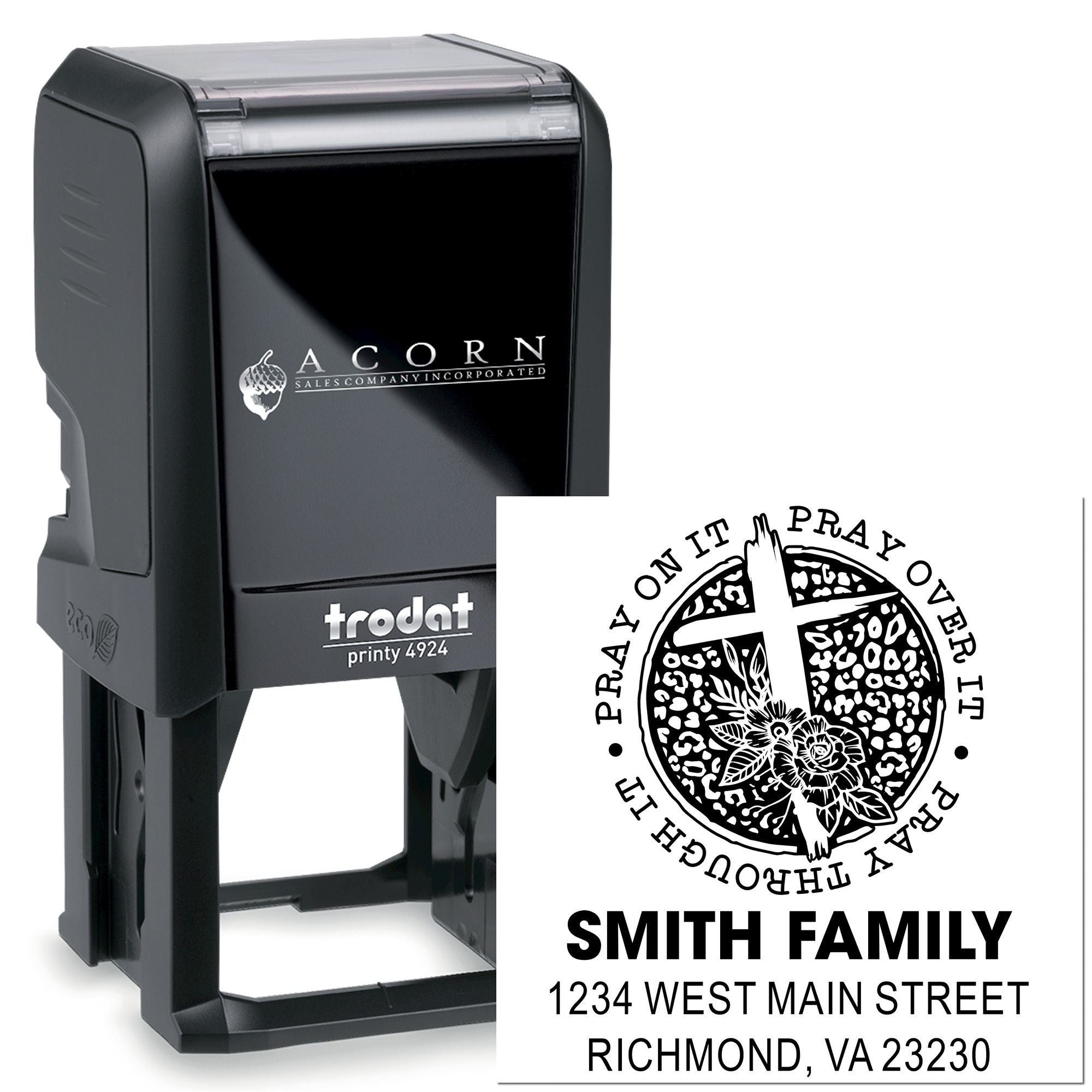 Custom self-inking rubber address stamp with family name, prayer design, and return mailing address for envelopes and cards.
