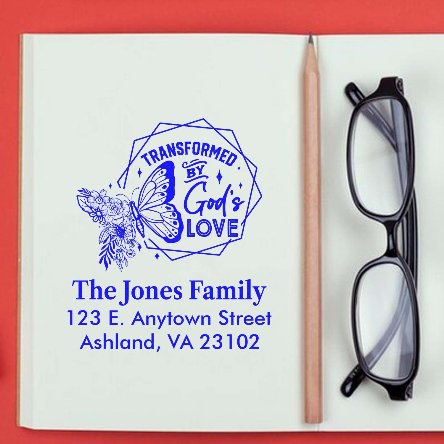 Custom faith rubber stamp with Transformed by Gods Love and personalized Jones Family return address.