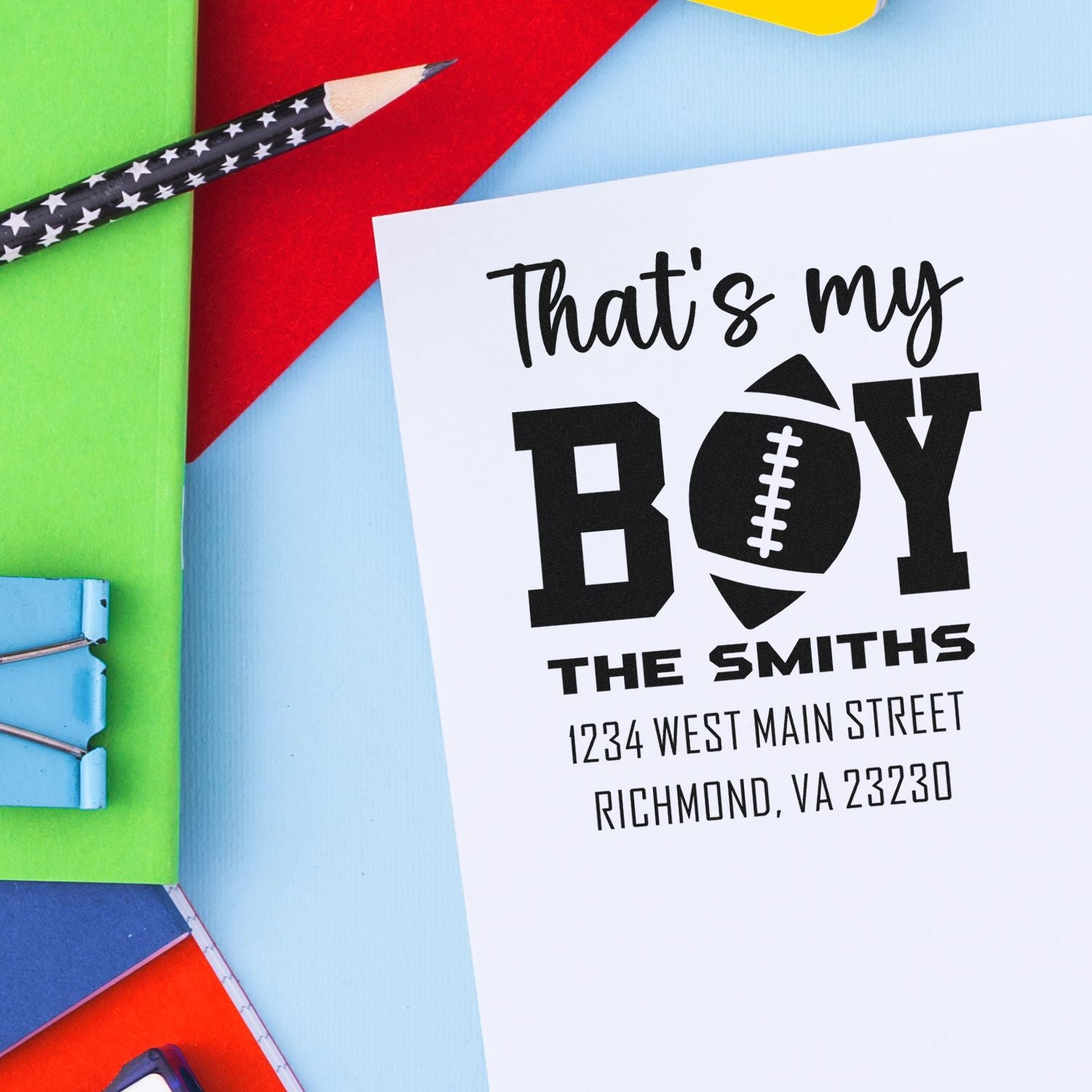 Custom address stamp with boy football design for personalized family return addresses and baby boy announcements.