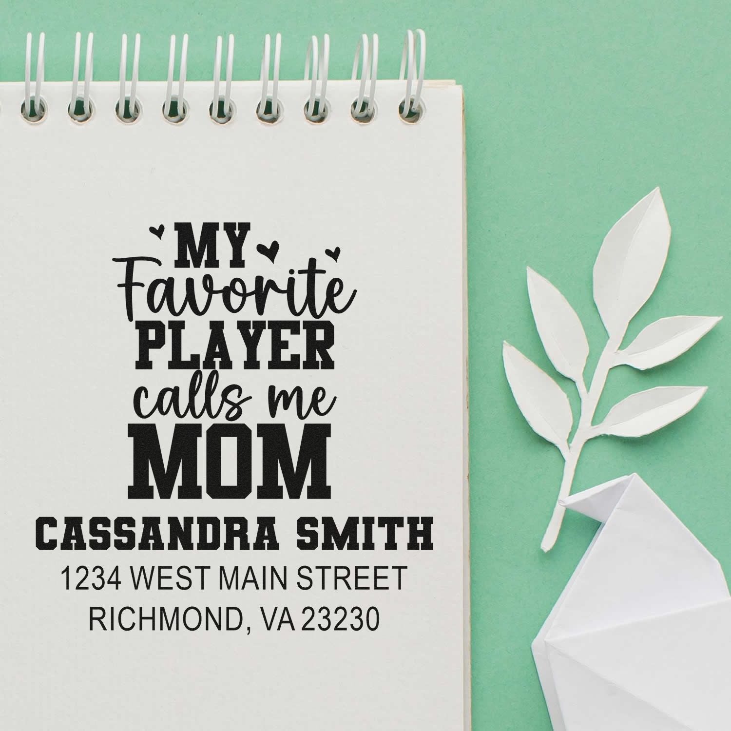 Personalized rubber stamp design for mom, reading My Favorite Player Calls Me Mom with name and address for stationery.