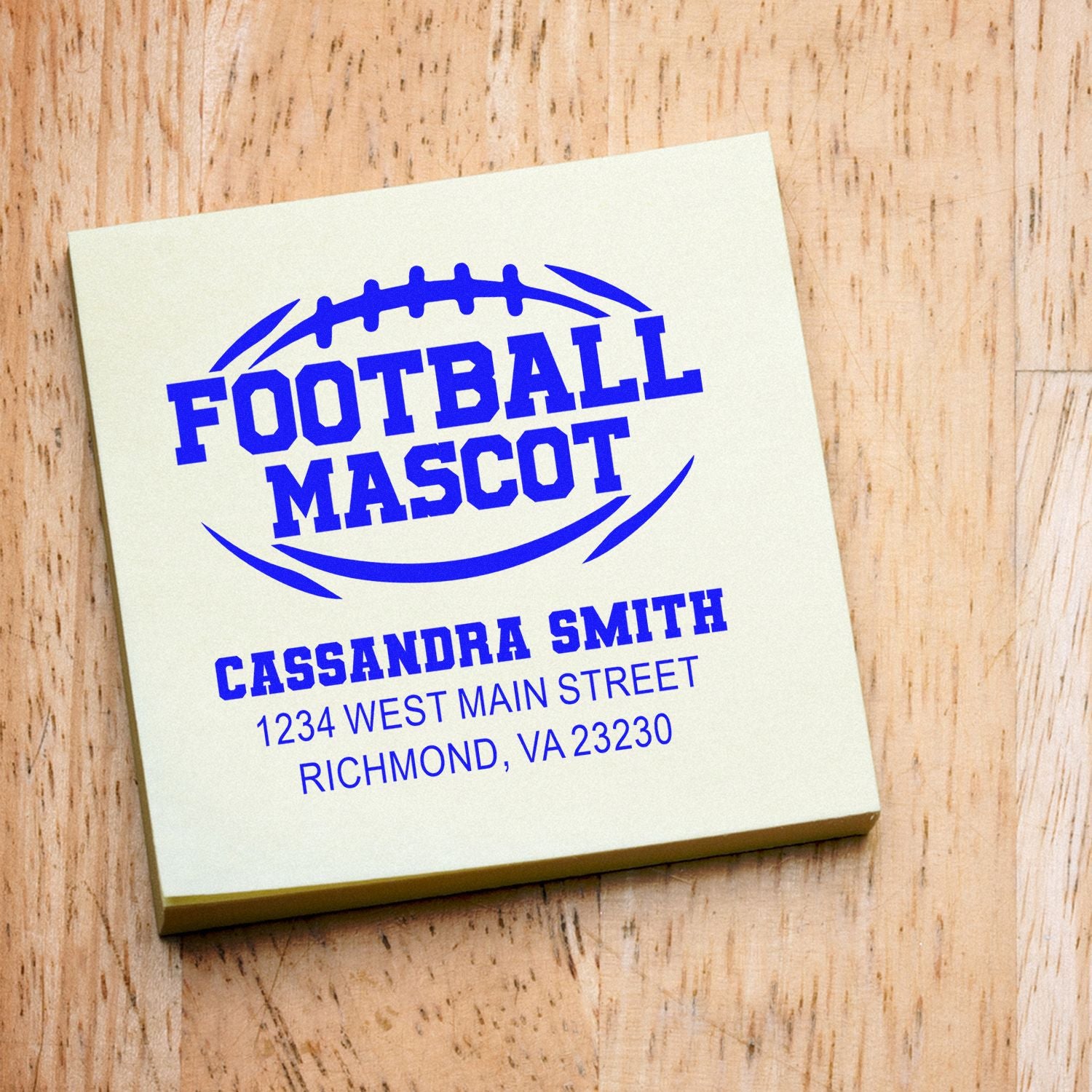 Custom football mascot rubber stamp with personalized name and address for Cassandra Smith