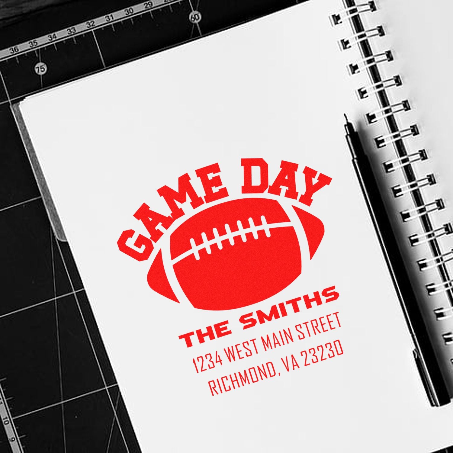 Custom football game day rubber stamp with family name and return address for sports invitations and mailings.