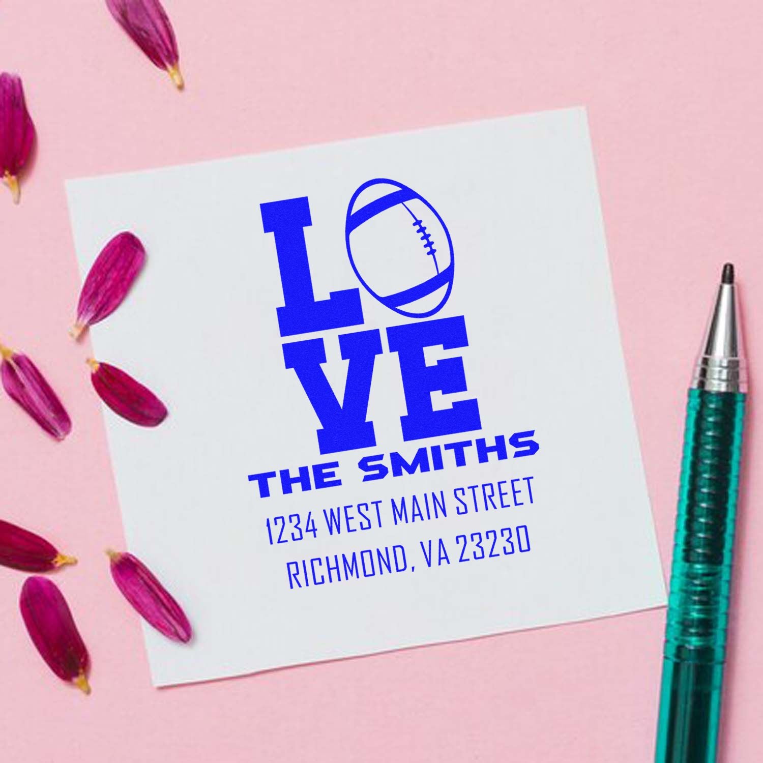 Custom rubber stamp design with LOVE football monogram and The Smiths address for personalized stationery.