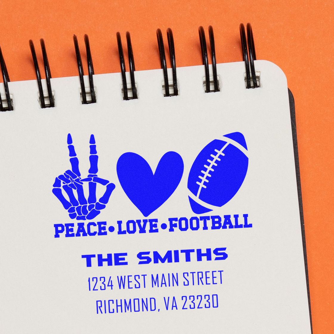 Blue custom rubber stamp imprint reading Peace Love Football with family name and return address for personalized mailing.