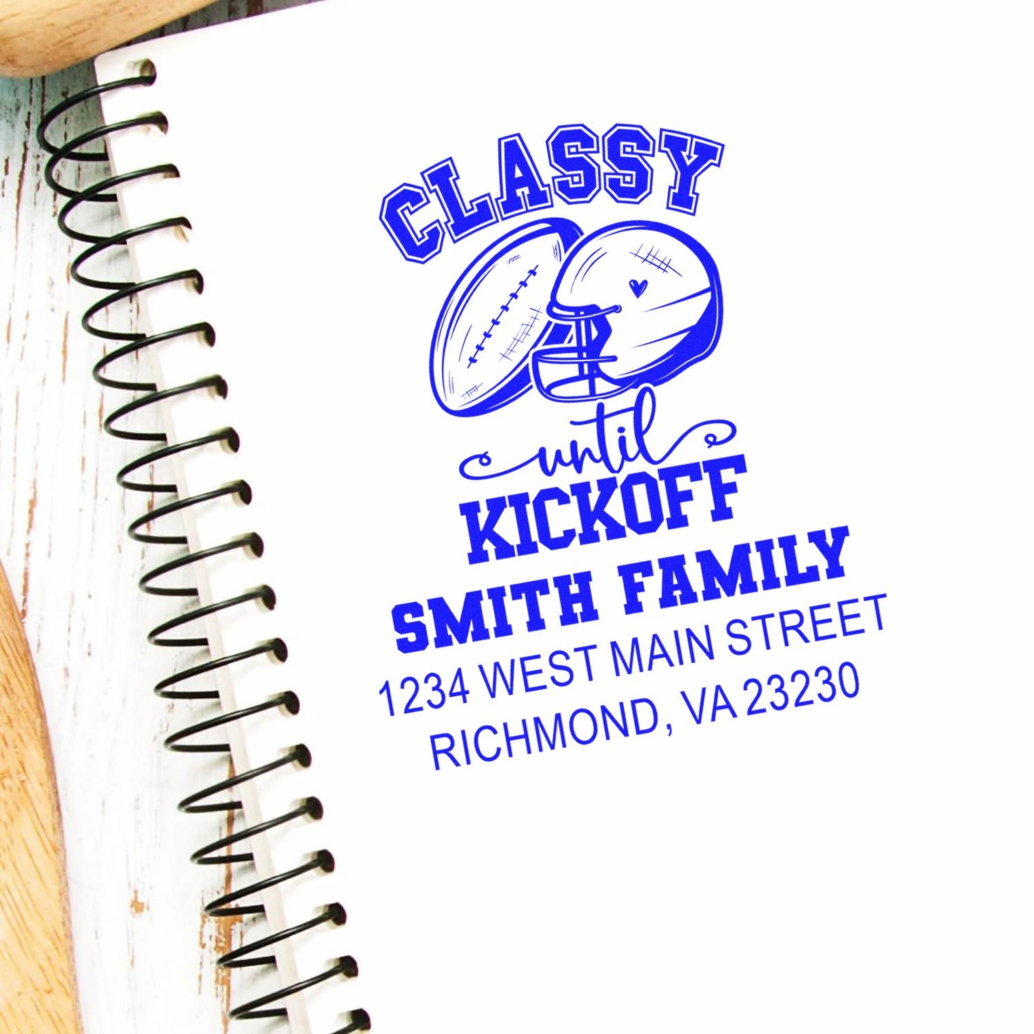 Personalized rubber stamp design for Smith family football notebook, featuring Classy until kickoff with helmet and address.