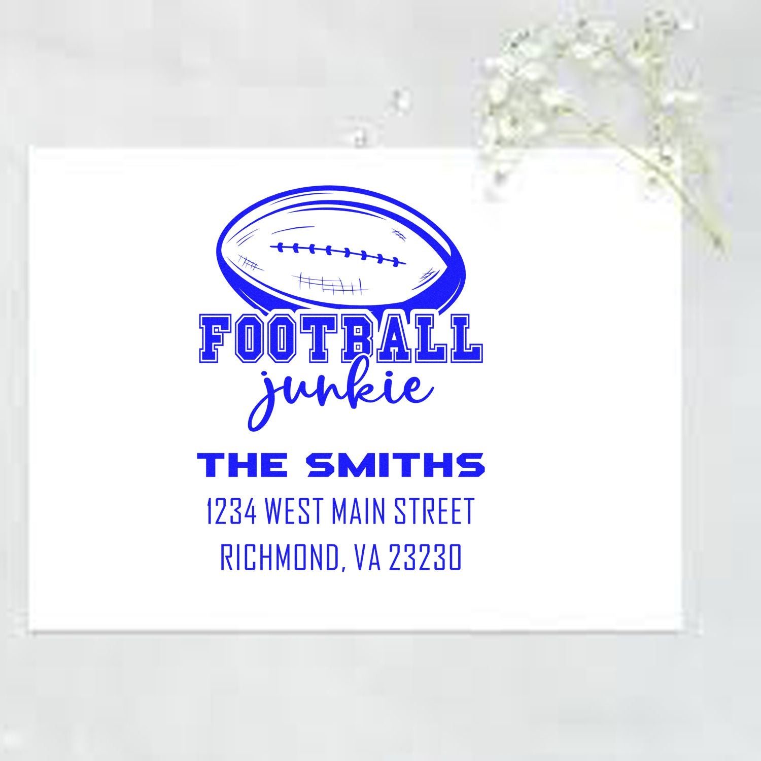 Custom football junkie return address rubber stamp with football graphic, family name, and Richmond, VA address.