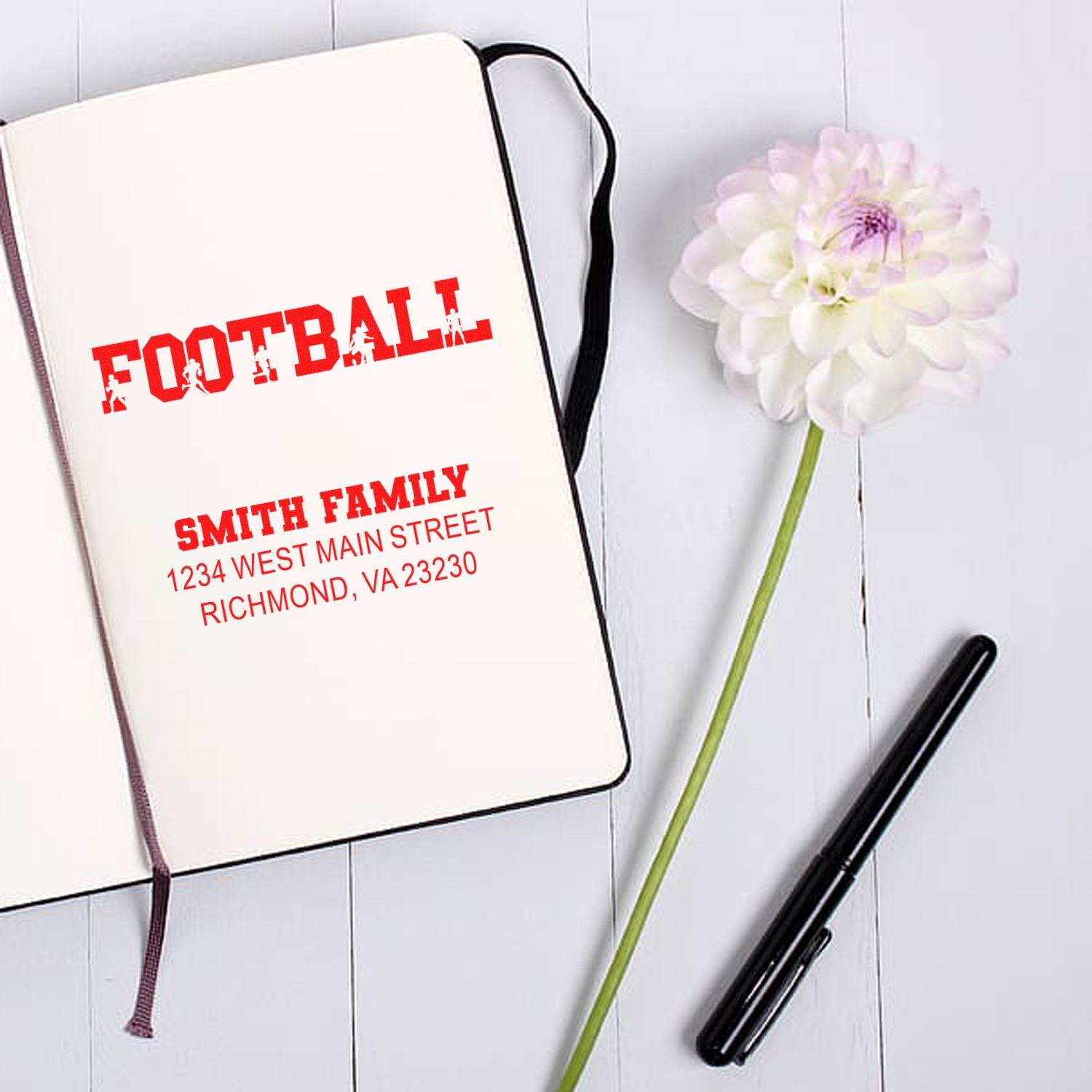 Football-themed custom rubber stamp with Smith family address, perfect for personalized mailing and sports fan stationery.