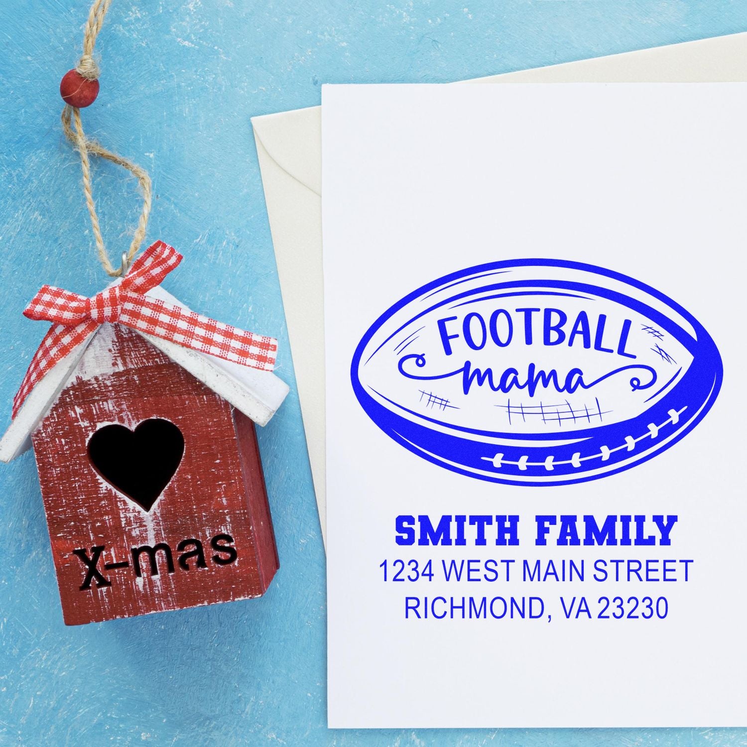 Custom rubber stamp mockup featuring a football mama return address stamp and personalized x-mas birdhouse stamp design.