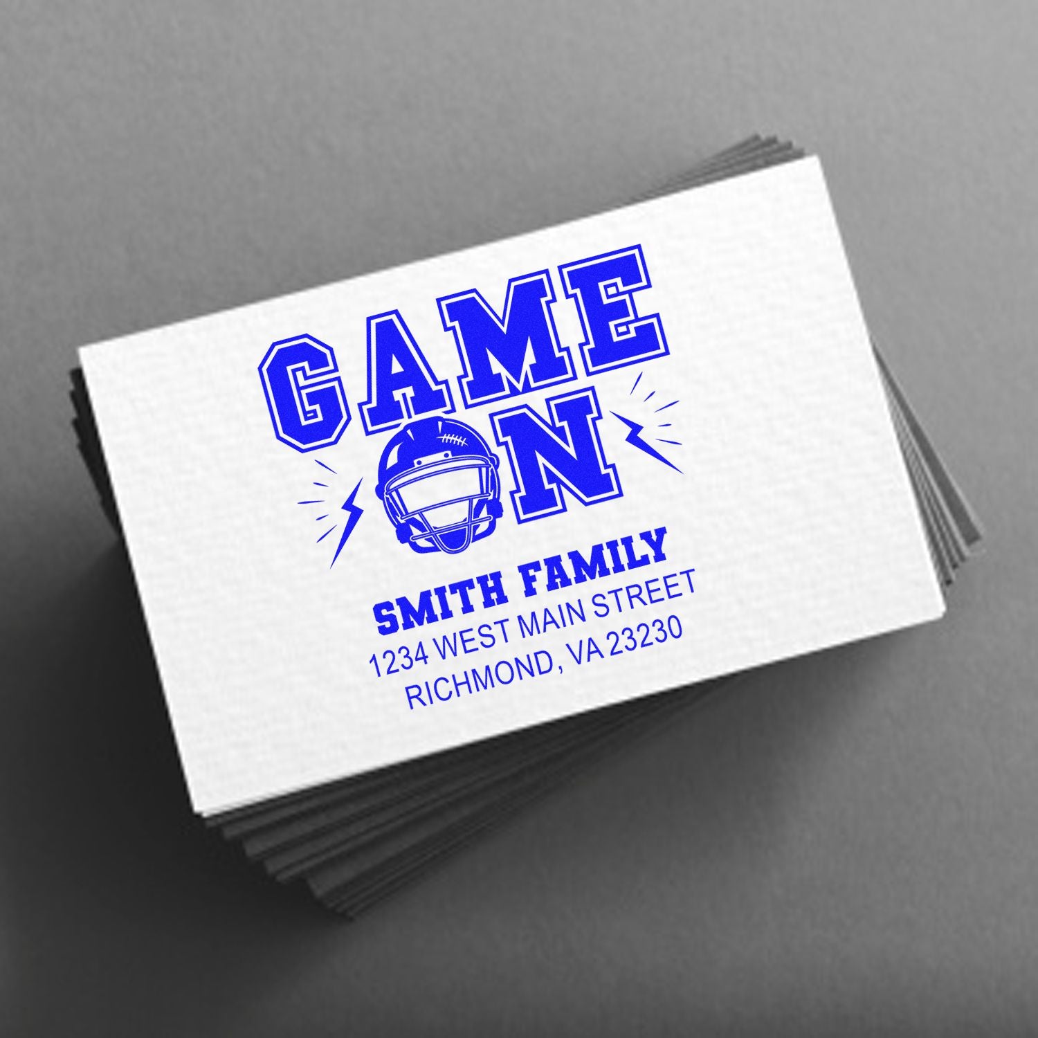Custom football Game On rubber stamp with helmet icon, Smith family name, and return address for personalized sports mail.