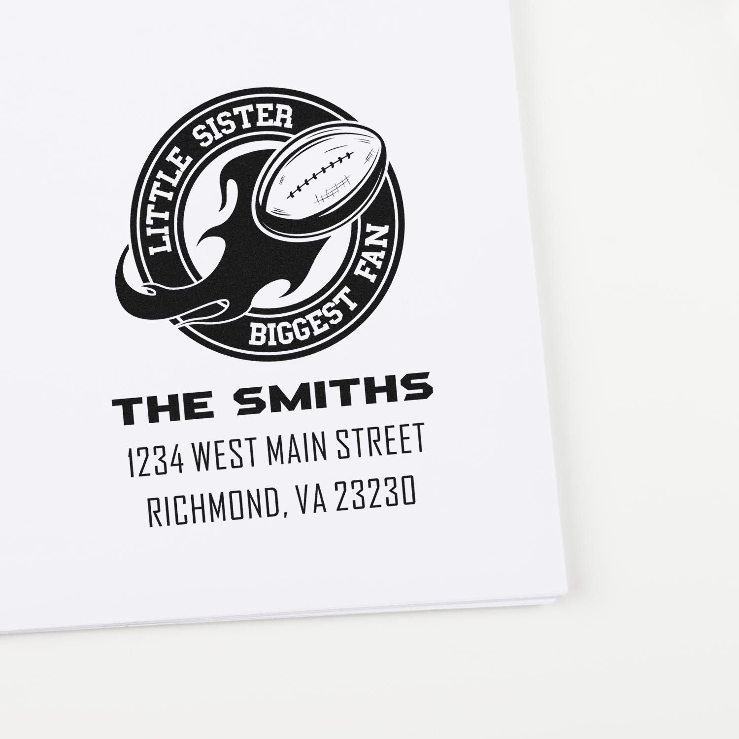 Custom rubber stamp for The Smiths featuring a Little Sister Biggest Fan football design with name and address.