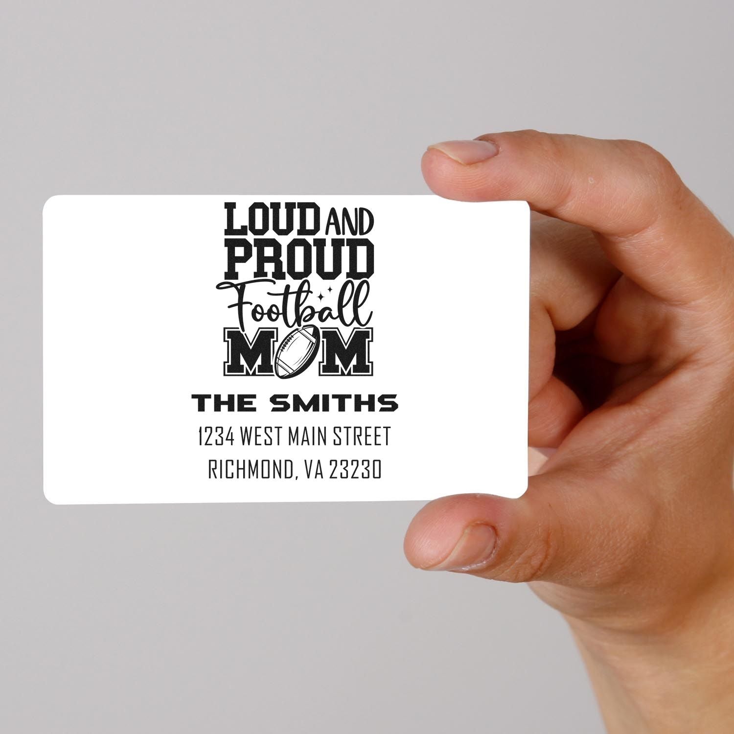 Personalized football mom address rubber stamp with family name and Richmond, VA mailing details.