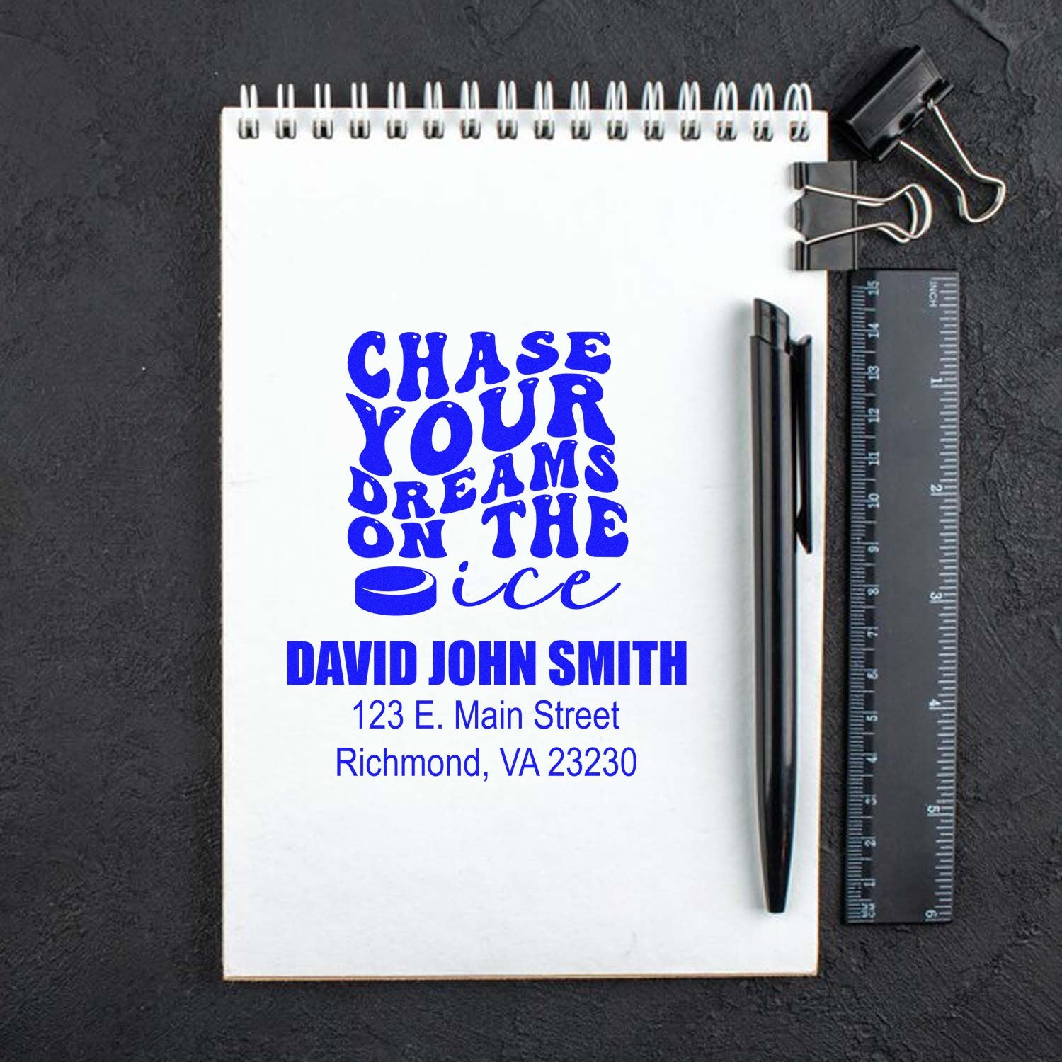 Custom return address rubber stamp with Chase Your Dreams design for stationery and business branding.