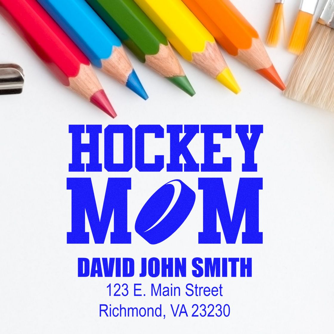 Custom hockey mom rubber stamp design with name and address, styled with colorful pencils for personalized crafting and stationery.
