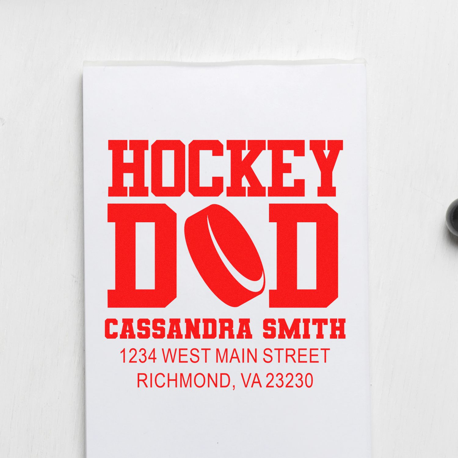 Personalized hockey dad rubber stamp with custom return address for Cassandra Smith, Richmond, VA.