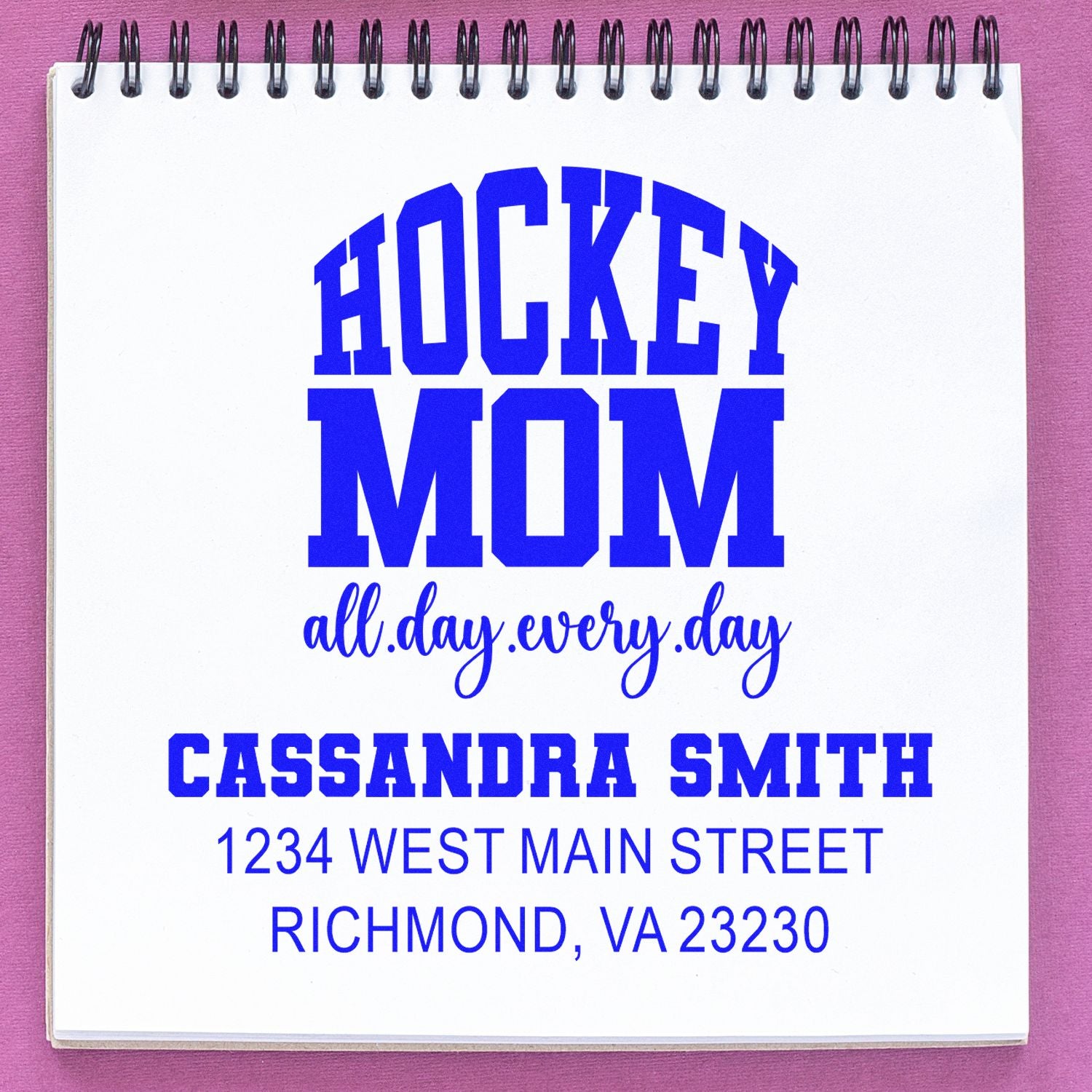 Personalized hockey mom rubber stamp design with bold blue text, name, and address.