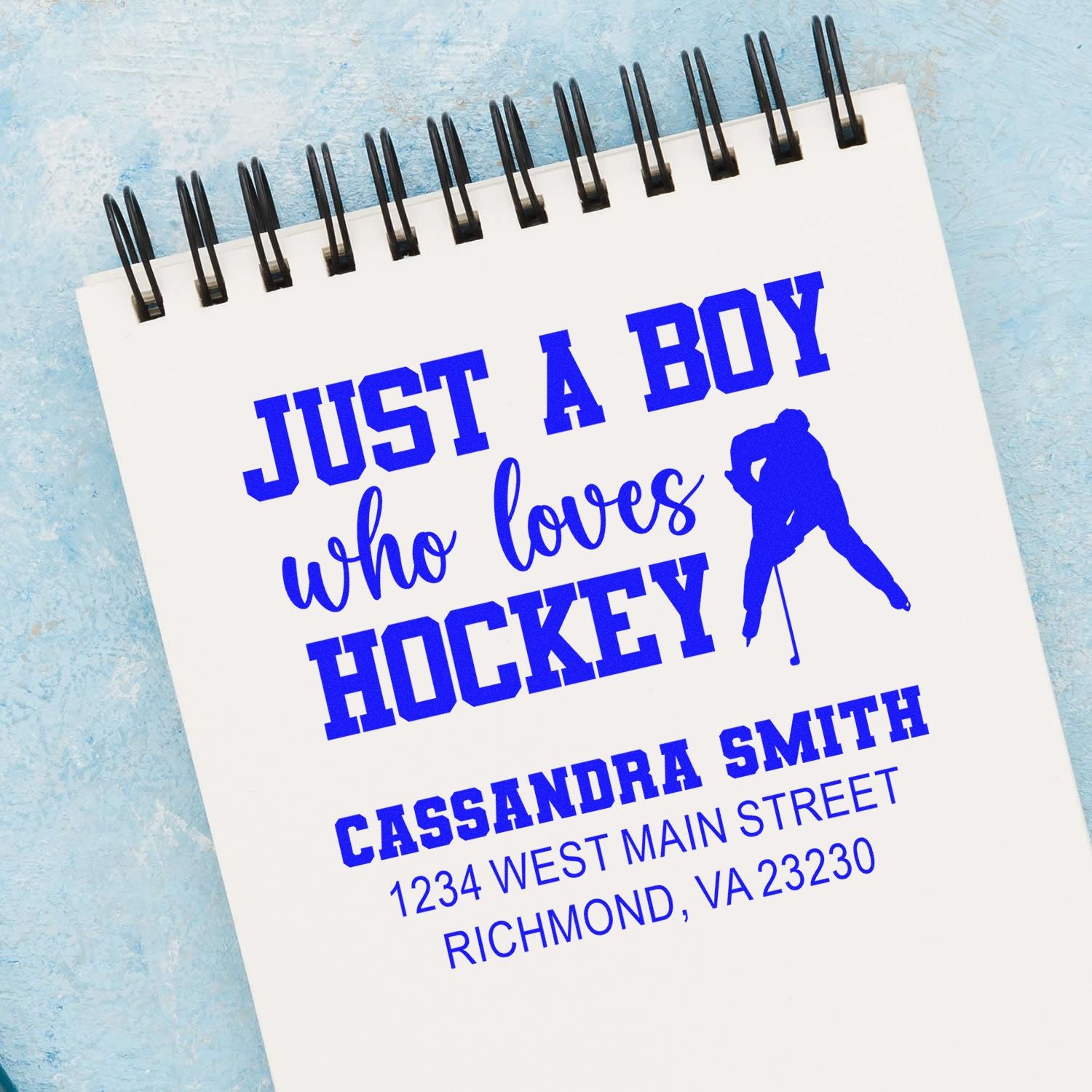 Custom hockey rubber stamp with Just a Boy Who Loves Hockey, personalized name, and return address.